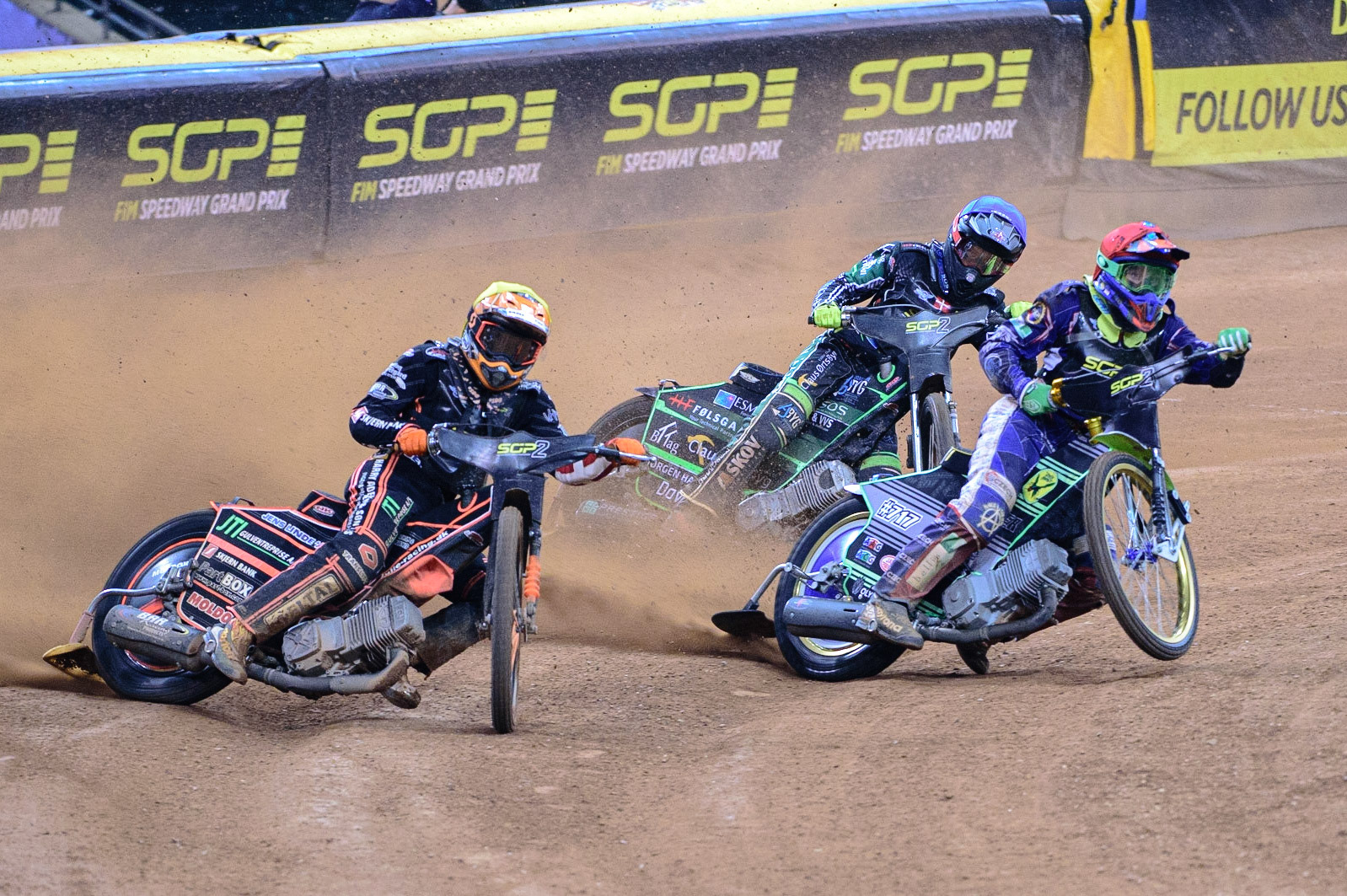 Kevin Juhl Pedersen (Denmark)  (Yellow) outside Daniel Klima (Czech Republic) (Red) with Jonas Knudsen (Denmark)  (Blue) behind during the FIM  Speedway Grand Prix  2 of Great Britain at the Principality Stadium, Cardiff on Sunday 14th August 2022. (Credit: Ian Charles | MI News)