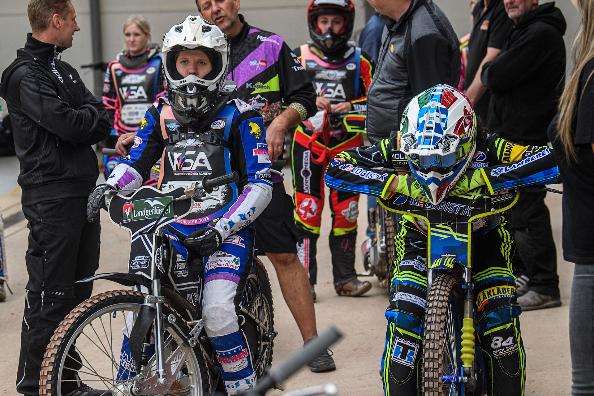 Anastasia Sallee (left) and Patricia Erhart wait to go out on track during the FIM Women's  Speedway Academy at the National Speedway Stadium, Manchester on Friday 4th August 2023. (Photo: Ian Charles | MI News)