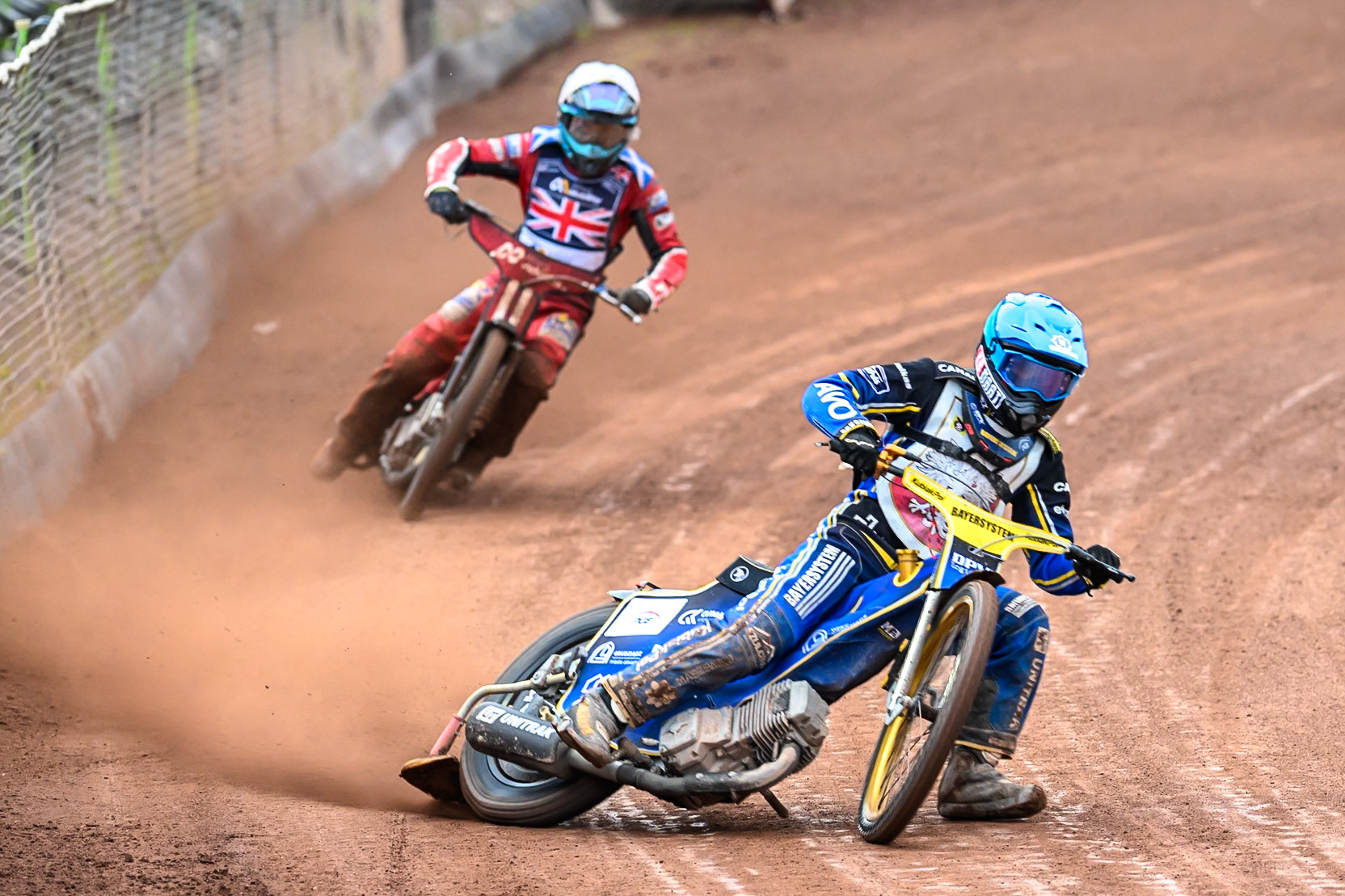 Jan Przanowski of Poland in Blue leading Ashton Boughen of Great Britain in White during the FIM SGP2 Qualifying Round at the Peugeot Ashfield Stadium in Glasgow on Saturday 24th May 2025. (Photo: Ian Charles | MI News)