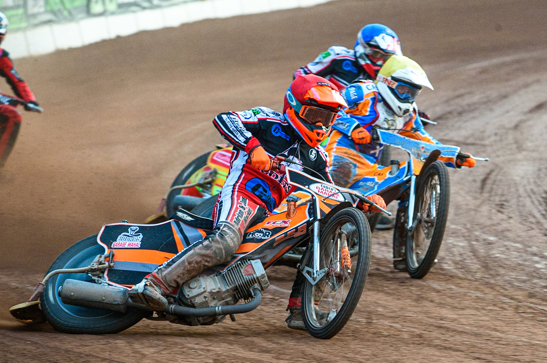 MANCHESTER, UK. JULY 23RD  Connor Coles  (Red) outside Danno Verge  (Yellow) and Ben Woodhull  (Blue)  during the National Development League match between Belle Vue Colts and Eastbourne Seagulls at the National Speedway Stadium, Manchester on Friday 23rd July 2021. (Credit: Ian Charles | MI News)