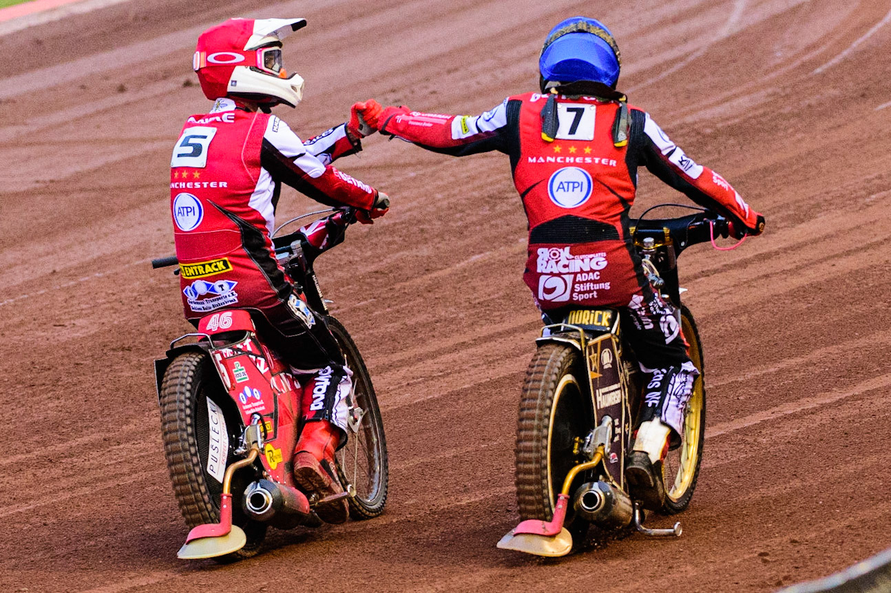Max Fricke (Red) and Norick Blödorn  (Blue) celebrate their heat win during the SGB Premiership match between Belle Vue Aces and Peterborough at the National Speedway Stadium, Manchester on Monday 25th July 2022. (Credit: Ian Charles | MI News