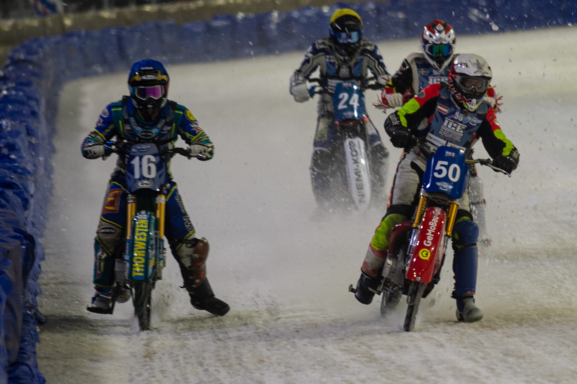 HEERENVEEN, NL. Harald Simon (50) (White) inside Luca Bauer (16) (Blue) with Joakim Söderström (904) (Red) and Max Koivula (24) (Yellow) behind during the FIM Ice Speedway Gladiators World Championship Final 3 at Ice Rink Thialf, Heerenveen on Saturday  2 April 2022. (Credit: Ian Charles | MI News)