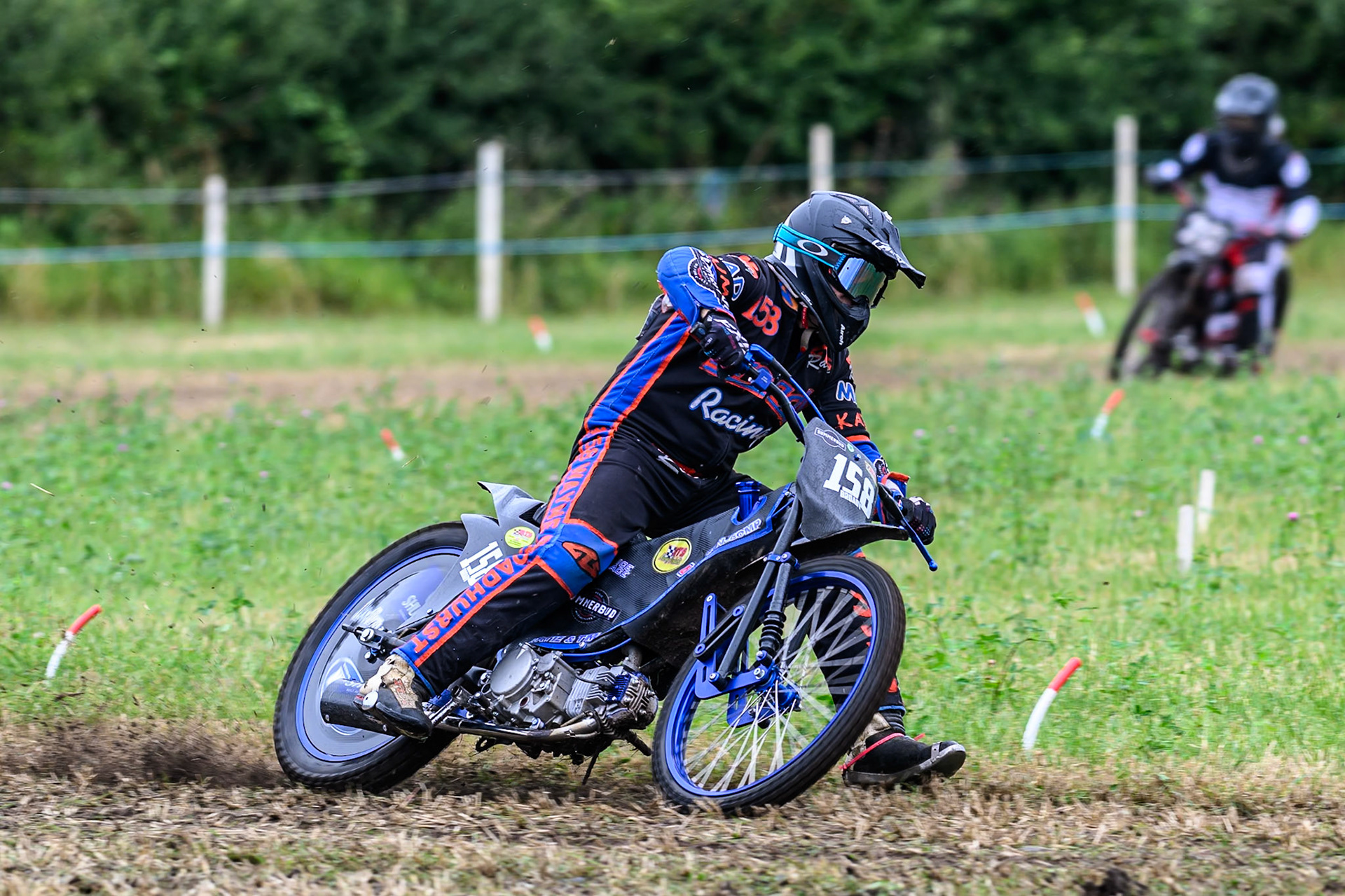 Mark Broadhurst (158) leads in the GT140 Class during the ACU Northern Grass Track Riders Championship at Cheshire Grass Track Club, Frog Lane, Knutsford, Cheshire on Sunday 20th July 2025. (Photo: Ian Charles | MI News)