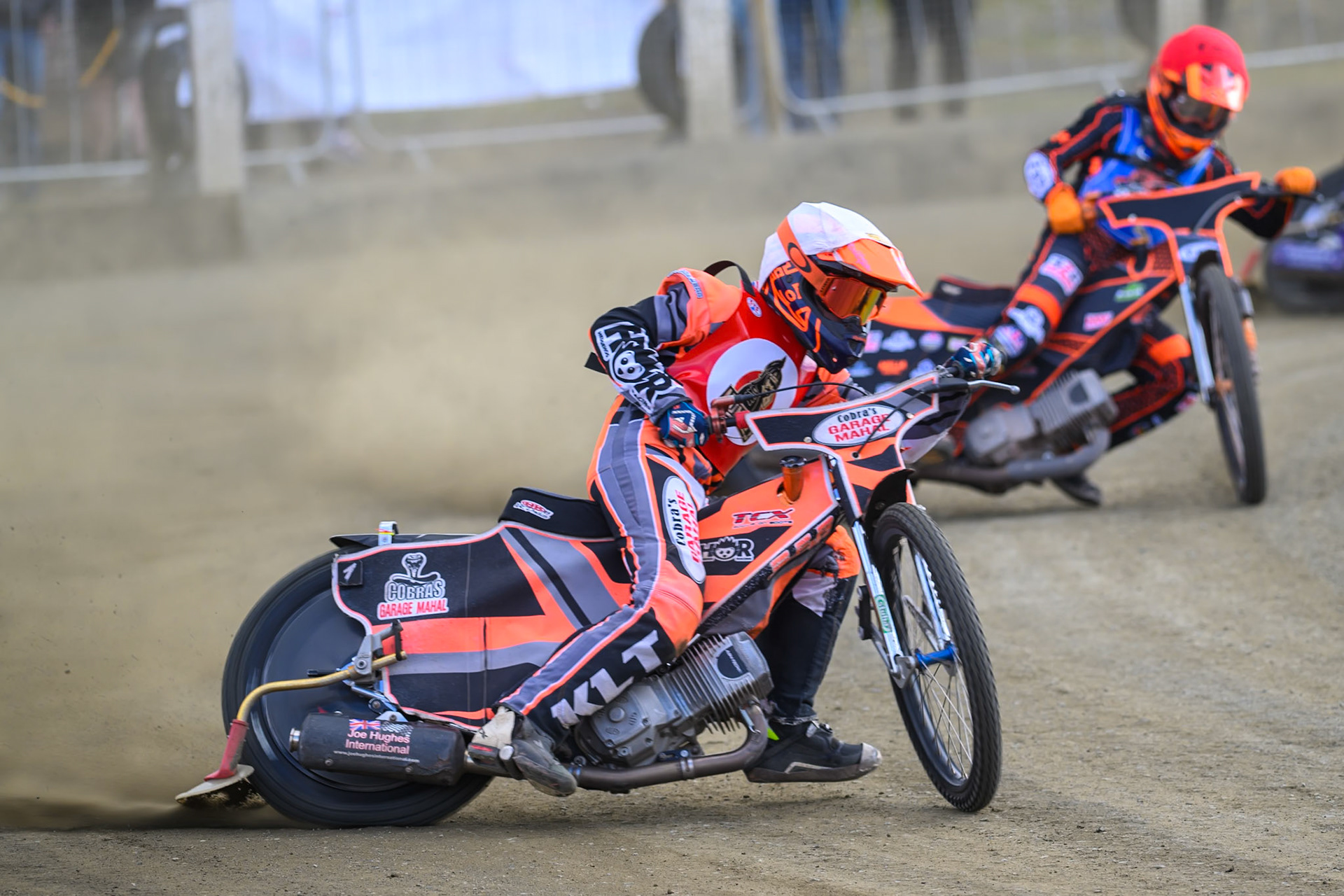 Connor Coles of NDL Nomads   in White leading Jack Smith of Buxton Bulls   in Red during the  Challenge match between Buxton Bulls and NDL Nomads at Hi-Edge Speedway, Buxton on Sunday 19th April 2026. (Photo: Ian Charles | MI News)