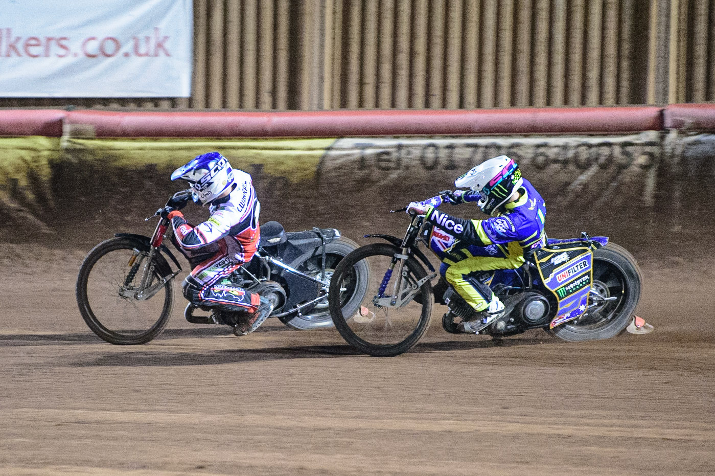MANCHESTER, UK. OCT 7TH  Richie Worrall  (Blue) leads Jack Holder  (White) during the SGB Premiership Play off Semi-Final Second Leg between Belle Vue Aces and Sheffield Tigers at the National Speedway Stadium, Manchester on Thursday 7th October 2021. (Credit: Ian Charles | MI News)