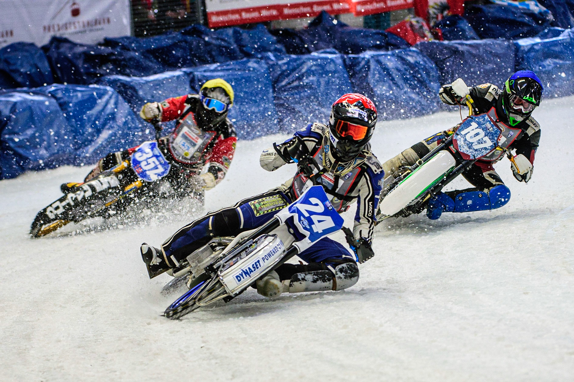 Max Koivula (24) (Red) leads Andrej Divis (107) (Blue) and Jo Saetre (357) (Yellow) during the Ice Speedway Gladiators World Championship Final 2 at Max-Aicher-Arena, Inzell, Germany on Sunday 19th March 2023. (Photo: Ian Charles | MI News)