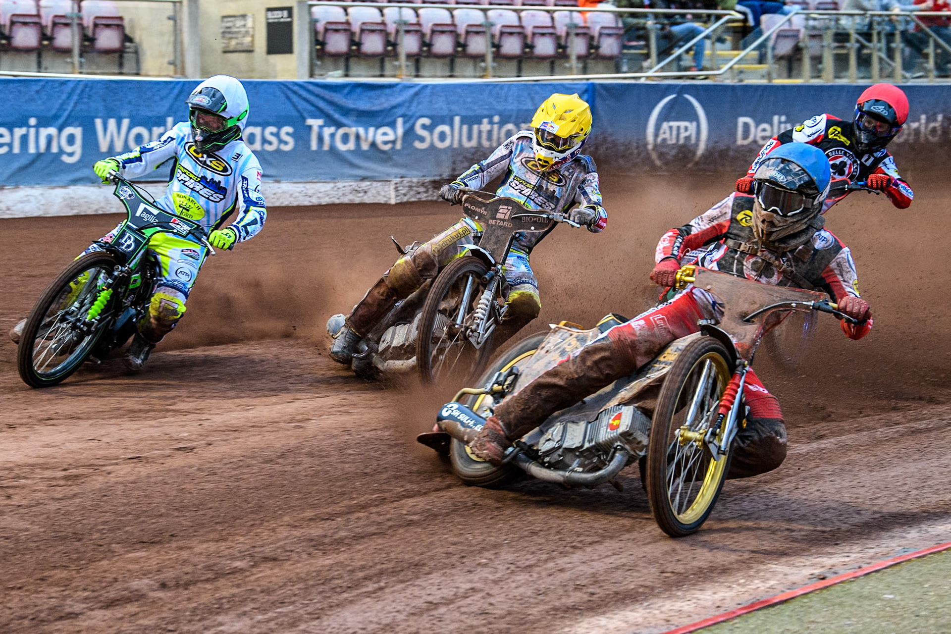 Belle Vue Aces' Norick Blodorn in Blue leading Oxford Spires' Charles Wright in White and Oxford Spires' Maciej Janowski in Yellow with Belle Vue Aces' Brady Kurtz in Red behind during the Rowe Motor Oil Premiership match between Belle Vue Aces and Oxford Spires at the National Speedway Stadium, Manchester on Monday 13th May 2024. (Photo: Ian Charles | MI News)