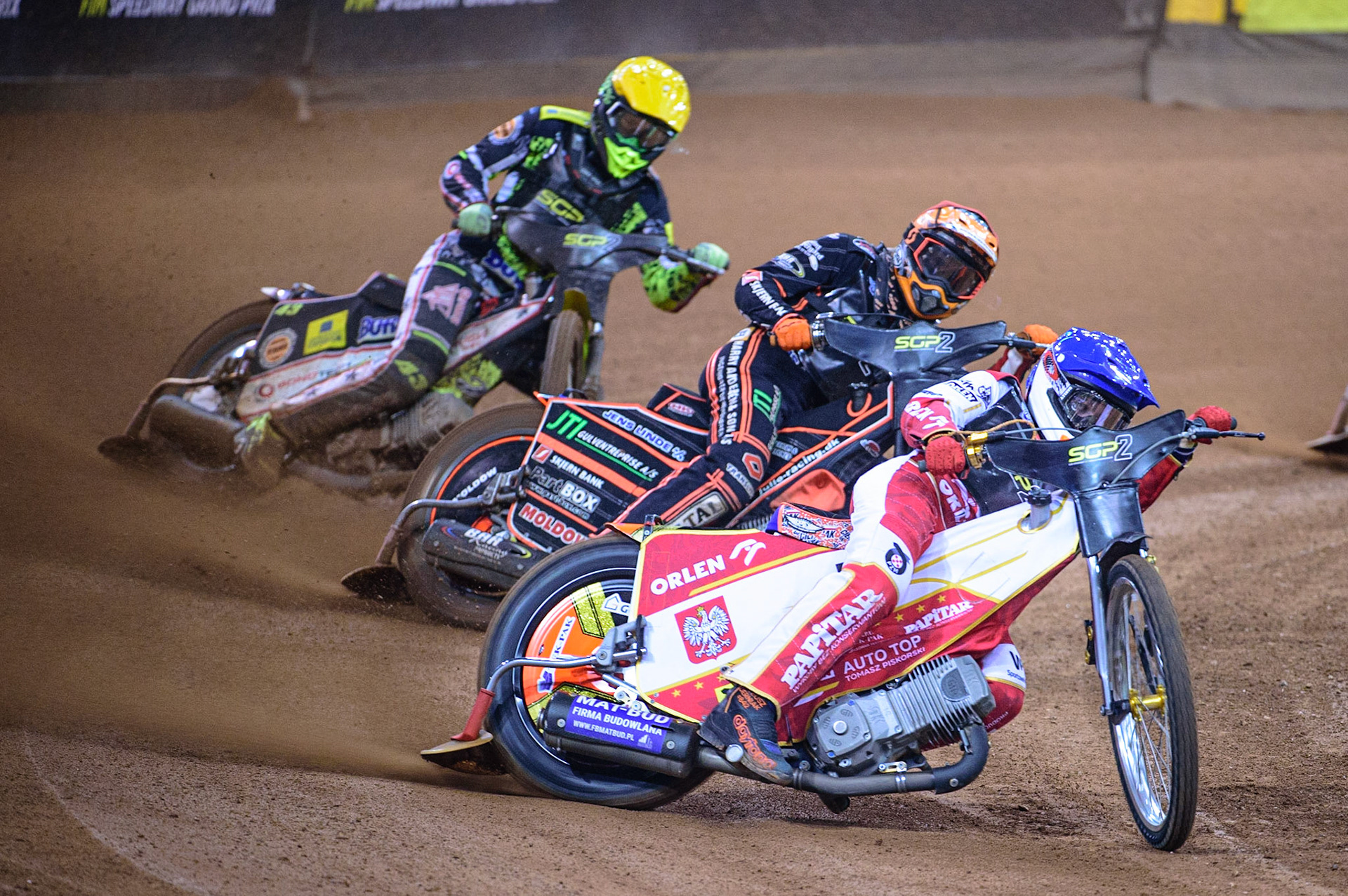 Mateusz Cierniak (Poland)  (Blue) leads Kevin Juhl Pedersen (Denmark)  (Red) and Casper Henriksson (Sweden)  (Yellow) during the FIM  Speedway Grand Prix  2 of Great Britain at the Principality Stadium, Cardiff on Sunday 14th August 2022. (Credit: Ian Charles | MI News)