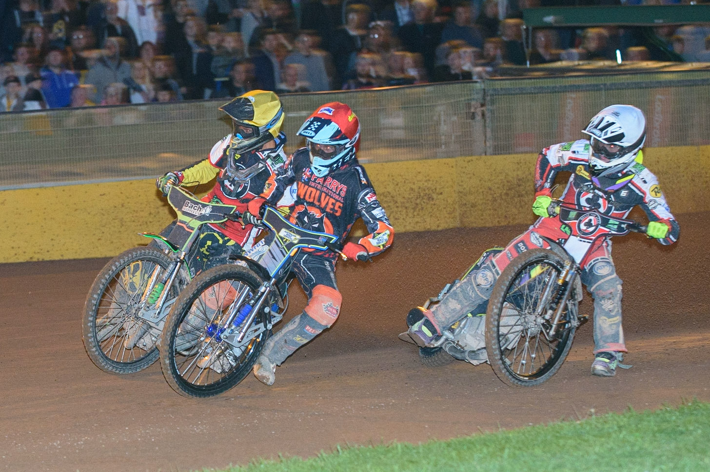 WOLVERHAMPTON, UK. AUGUST 30TH. Ryan Douglas  (Red) leads Tom Brennan  (White) and Nikolaj B. Jakobsen  (Yellow)during the SGB Premiership match between Wolverhampton Wolves and Belle Vue Aces at Monmore Green Stadium, Wolverhampton on Monday 30th August 2021. (Credit: Ian Charles | MI News)