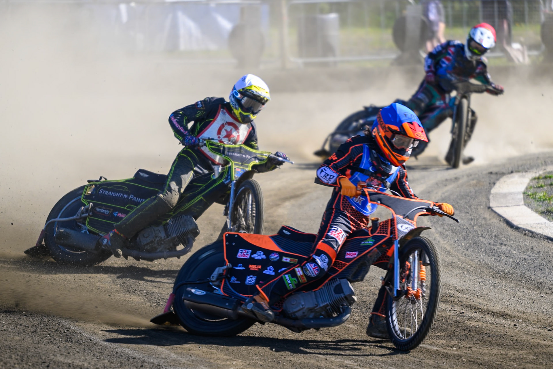 Jack Smith of Buxton Bulls  in Blue leading Ben Whalley of Stoke Potters  in White and Alfie Bowtell of Buxton Bulls in Red during the National Development League Challenge match between Buxton Bulls and Stoke Potters at Hi-Edge Speedway, Buxton on Sunday 24th May 2026. (Photo: Ian Charles | MI News)