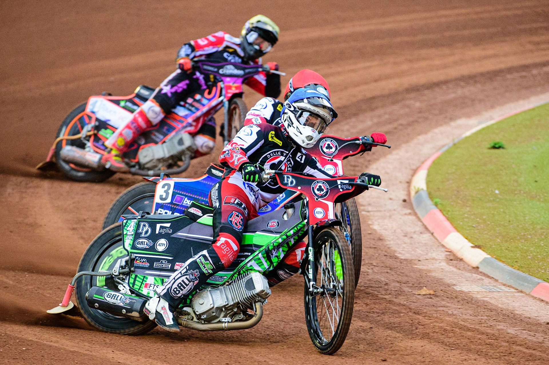 Charles Wright (Blue) leads team mate Brady Kurtz (Red) lead Scott Nicholls  (Yellow) during the SGB Premiership match between Belle Vue Aces and Peterborough at the National Speedway Stadium, Manchester on Monday 25th July 2022. (Credit: Ian Charles | MI News