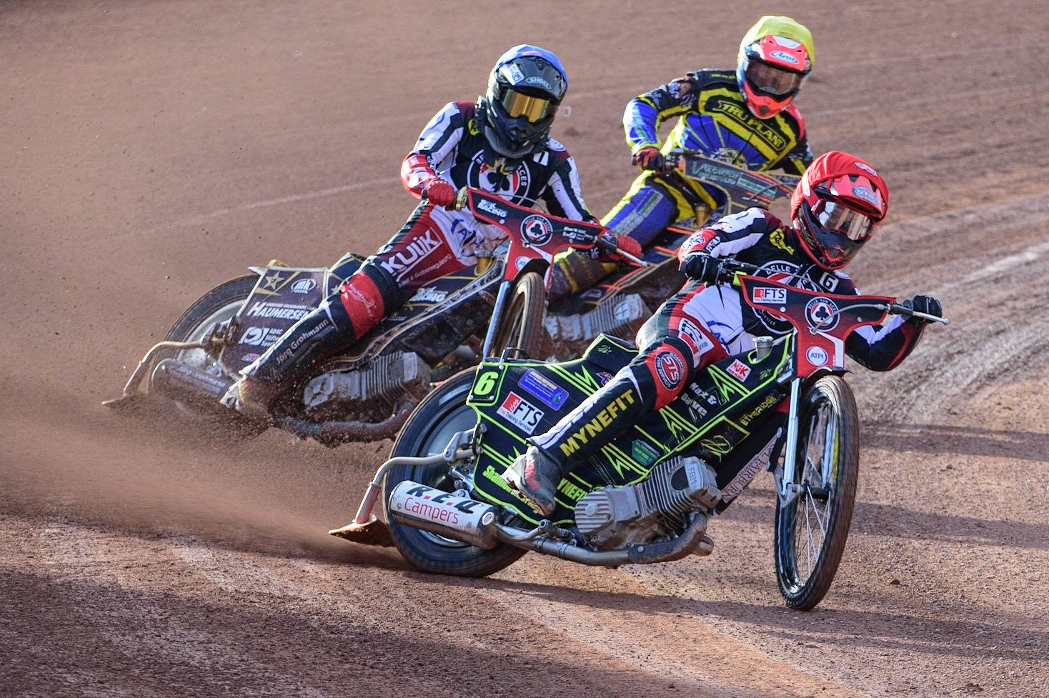MANCHESTER, UK. JUL 5TH  Jye Etheridge  (Red) leads Norick Blodorn  (Blue) and Connor Mountain  (Yellow)  during the SGB Premiership match between Belle Vue Aces and Sheffield Tigers at the National Speedway Stadium, Manchester on Tuesday 5th July 2022. (Credit: Ian Charles | MI News)
