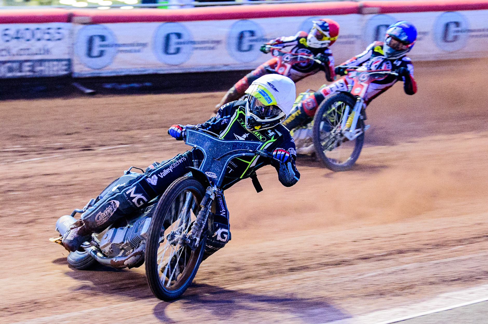 Rohan Tungate (White) on his way to beating Charles Wright  (Red) and Jye Etheridge  (Blue) during the SGB Premiership match between Belle Vue Aces and Ipswich Witches at the National Speedway Stadium, Manchester on Monday 8th August 2022. (Credit: Ian Charles | MI News)