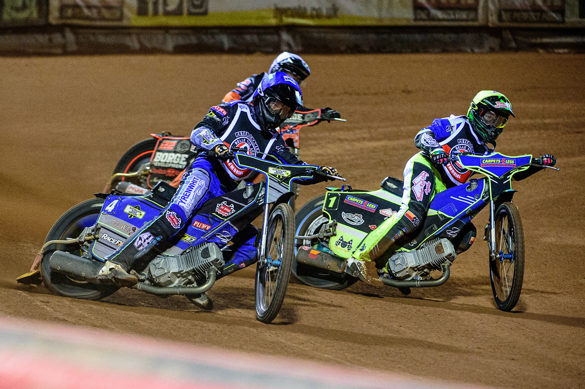 MANCHESTER, UK. OCT 23RD  Ryan Douglas  (Blue) outside Nick Morris (Yellow) with Luke Becker  (White) behind during the Peter Craven Memorial Trophy event at the National Speedway Stadium, Manchester on Saturday 23rd October 2021. (Credit: Ian Charles | MI News)