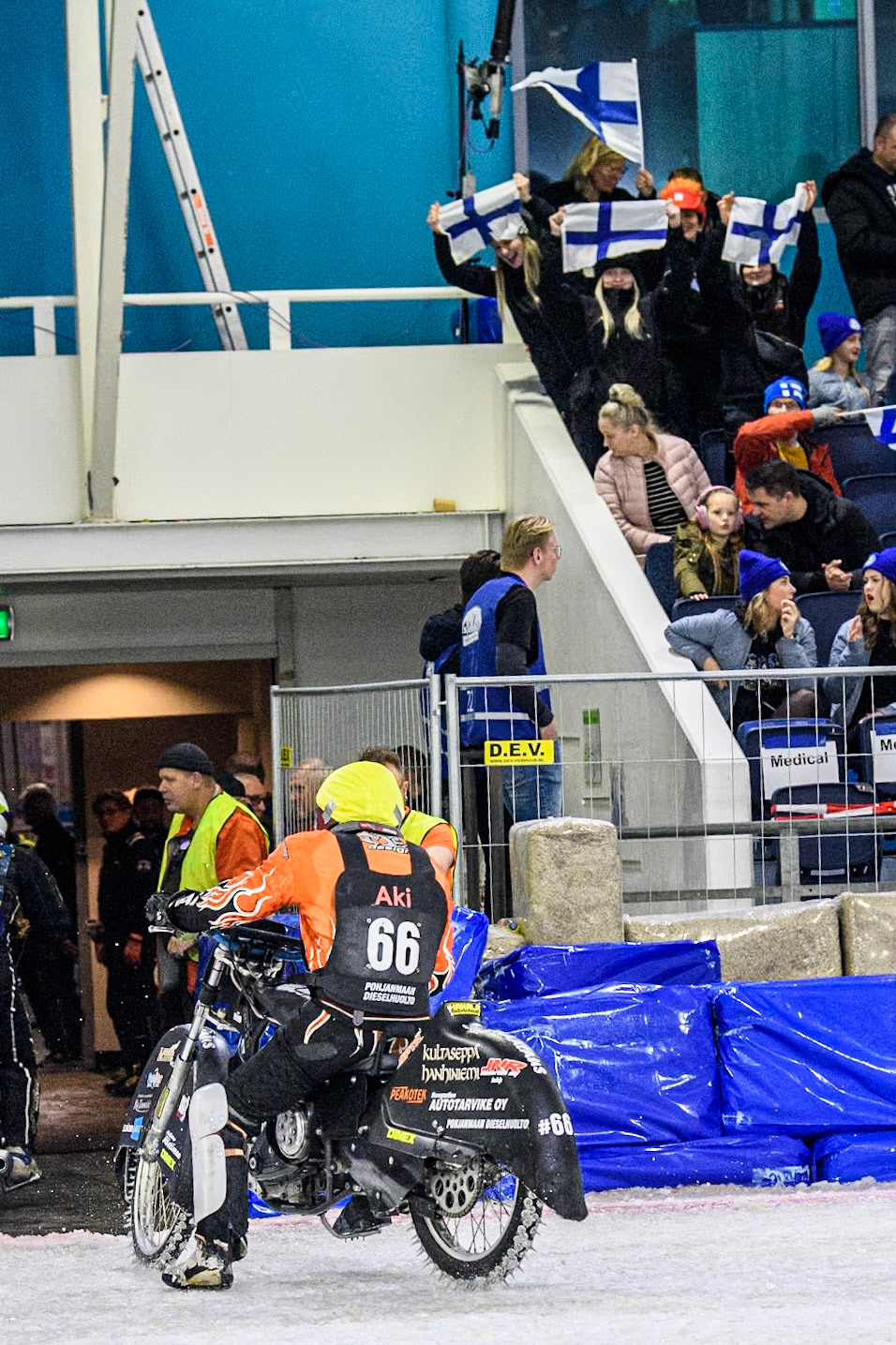 The Finnish fans celebrate Finland's Aki Ala-Riihimäki’s win during the FIM Ice Speedway Gladiators World Championship Final 3 at Ice Rink Thialf, Heerenveen on Saturday 6th April 2024. (Photo: Ian Charles | MI News)