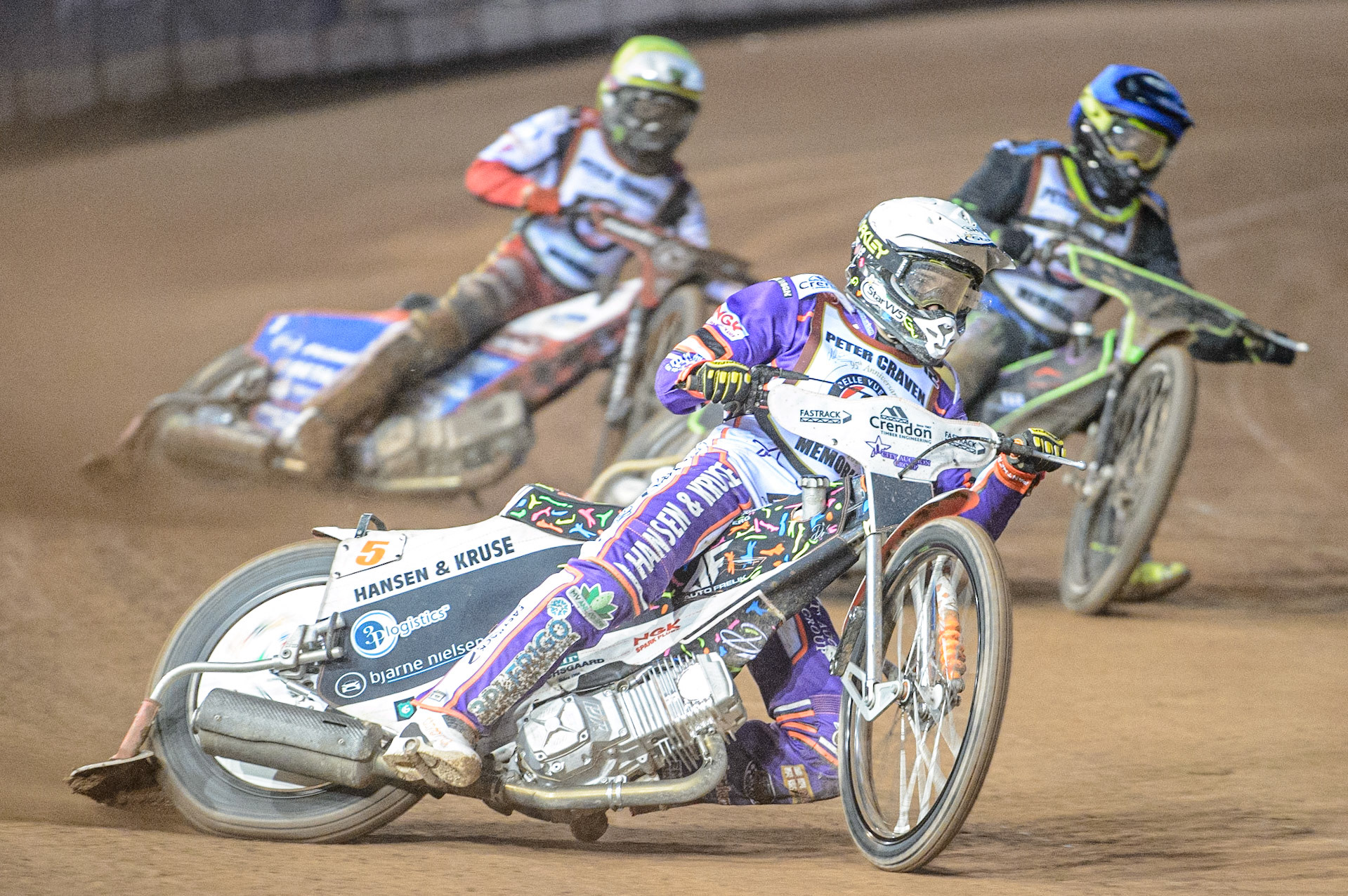 Niels-Kristian Iversen (White) leads Tom Brennan  (Blue) and Jaimon Lidsey  (Yellow) during the Peter Craven Memorial Trophy  at the National Speedway Stadium, Manchester on Monday 3rd April 2023. (Photo: Ian Charles | MI News)