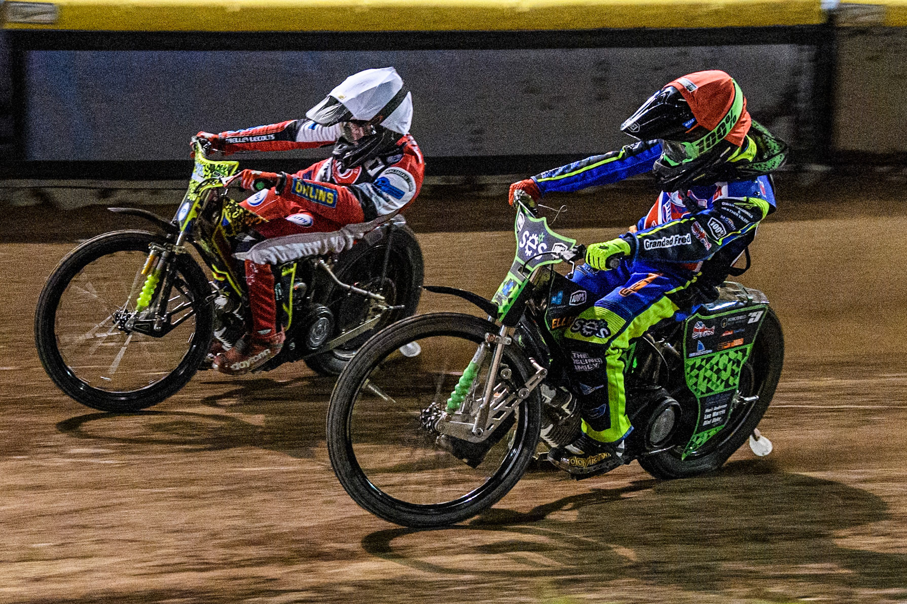 Steelers' Luke Harrison in Red rides inside Belle Vue Colts' William Cairns in White during the WSRA National Development League match between Steelers and Belle Vue Colts at Owlerton Stadium, Sheffield on Monday 5th May 2025. (Photo: Ian Charles | MI News)