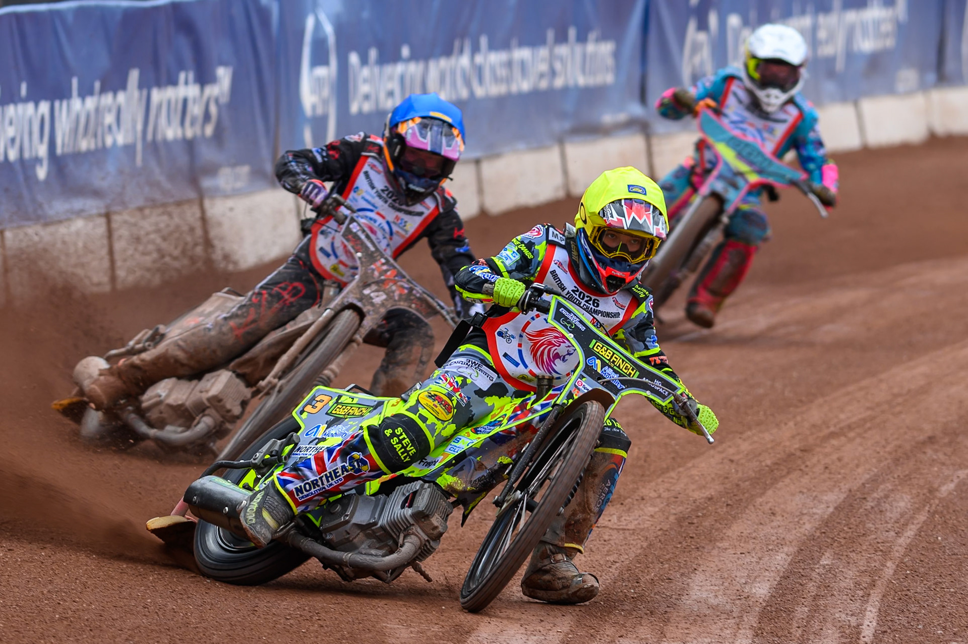 BRITISH YOUTH CHAMPIONSHIP (250cc): Archie Rolph (3) in Yellow leading Kane Newby (14) in Blue and Demi Blu Harris (22)  in White during the British Youth Speedway Championship at the National Speedway Stadium, Manchester on Sunday 10th May 2026. (Photo: Ian Charles | MI News)