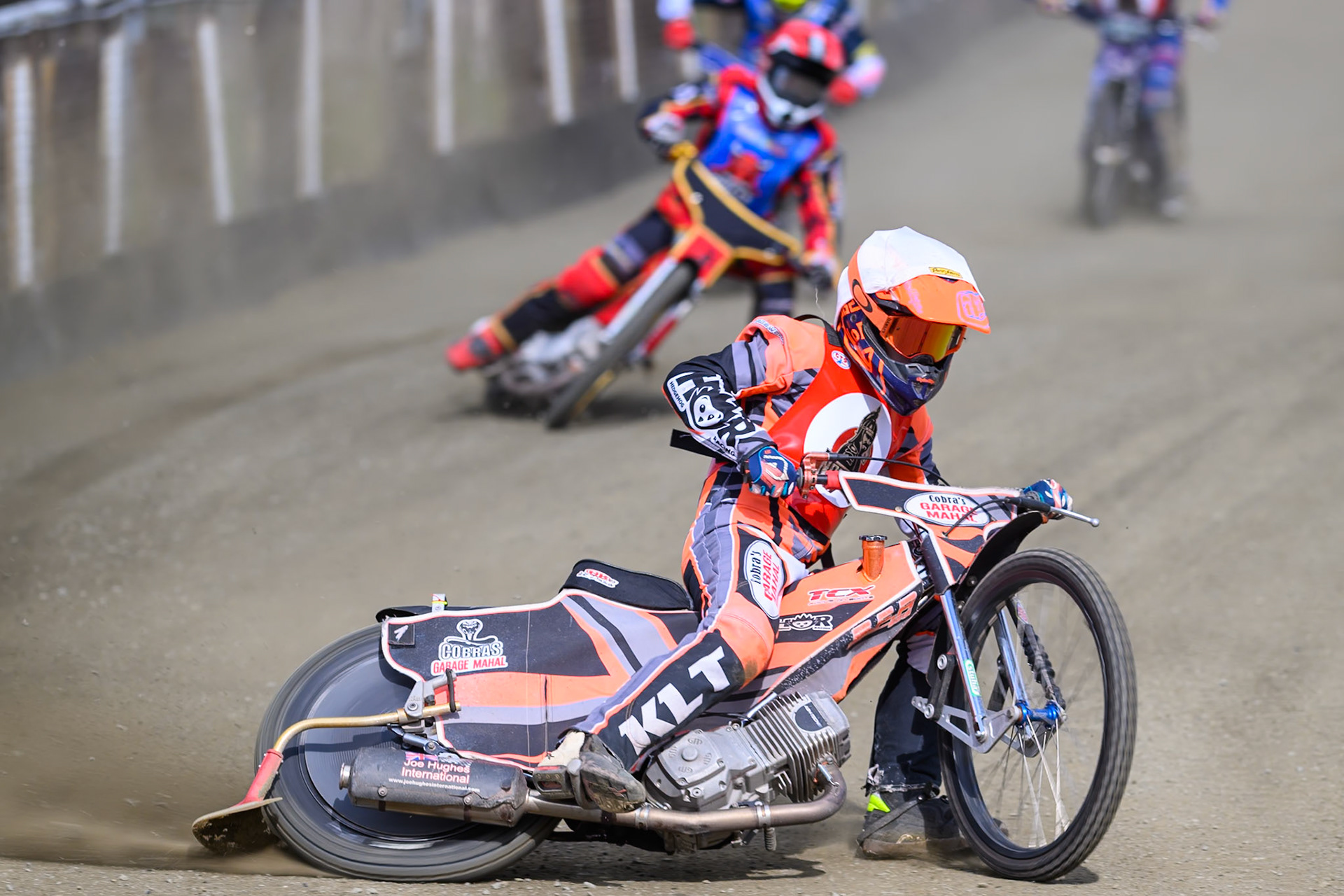 Connor Coles of NDL Nomads   in White leading Luke Harris of Buxton Bulls   in Red during the  Challenge match between Buxton Bulls and NDL Nomads at Hi-Edge Speedway, Buxton on Sunday 19th April 2026. (Photo: Ian Charles | MI News)