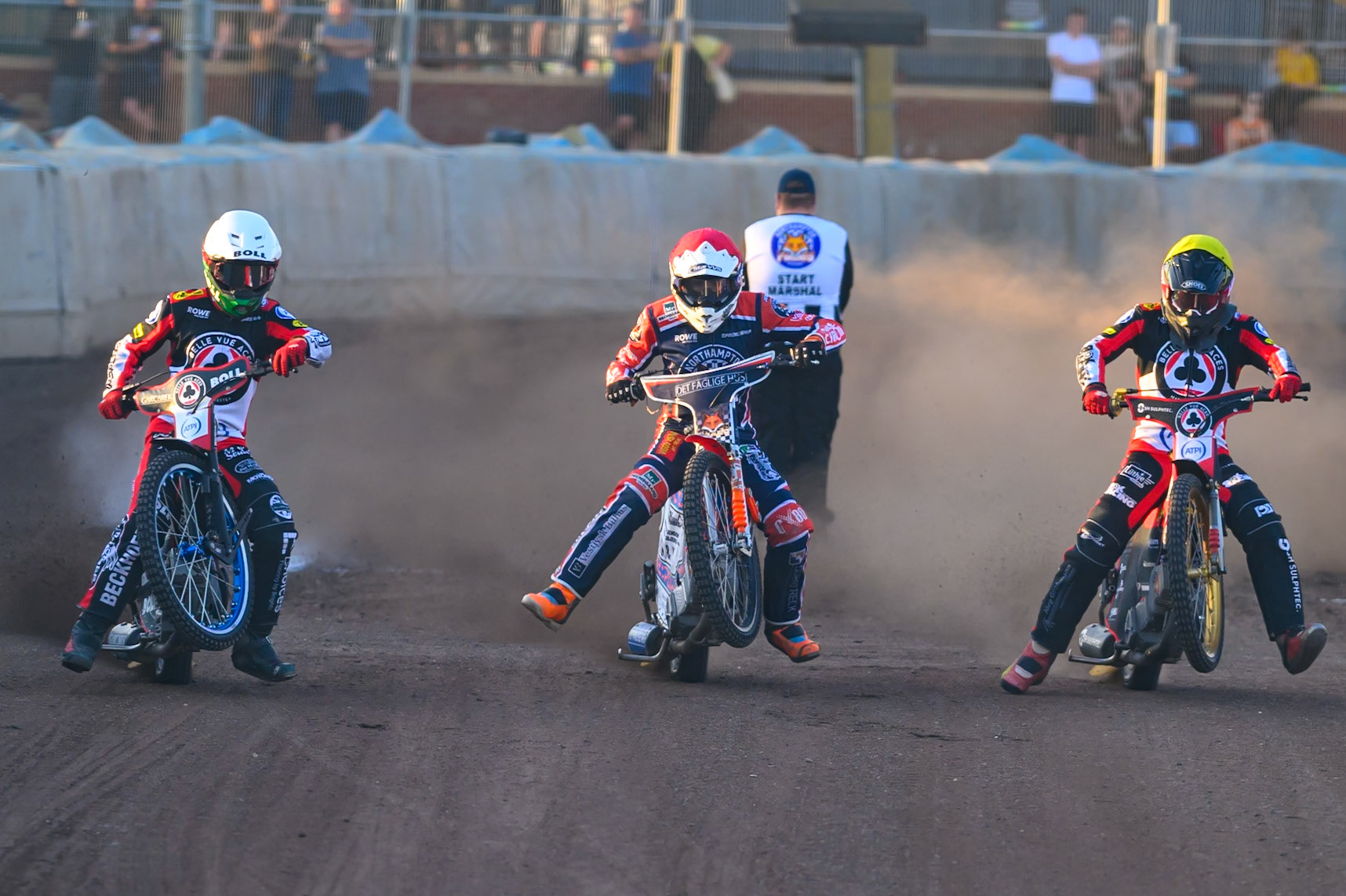 (L to R) Brady Kurtz of Belle Vue Aces  in White Niels-Kristian Iversen of Northampton Foxes  in Red  and Norick Blodorn of Belle Vue Aces  in Yellow  leave the start during the Rowe Motor Oil Premiership match between Northampton Foxes and Belle Vue Aces at Northampton International Shaleway, Northampton on Thursday 13th August 2026. (Photo: Ian Charles | MI News)