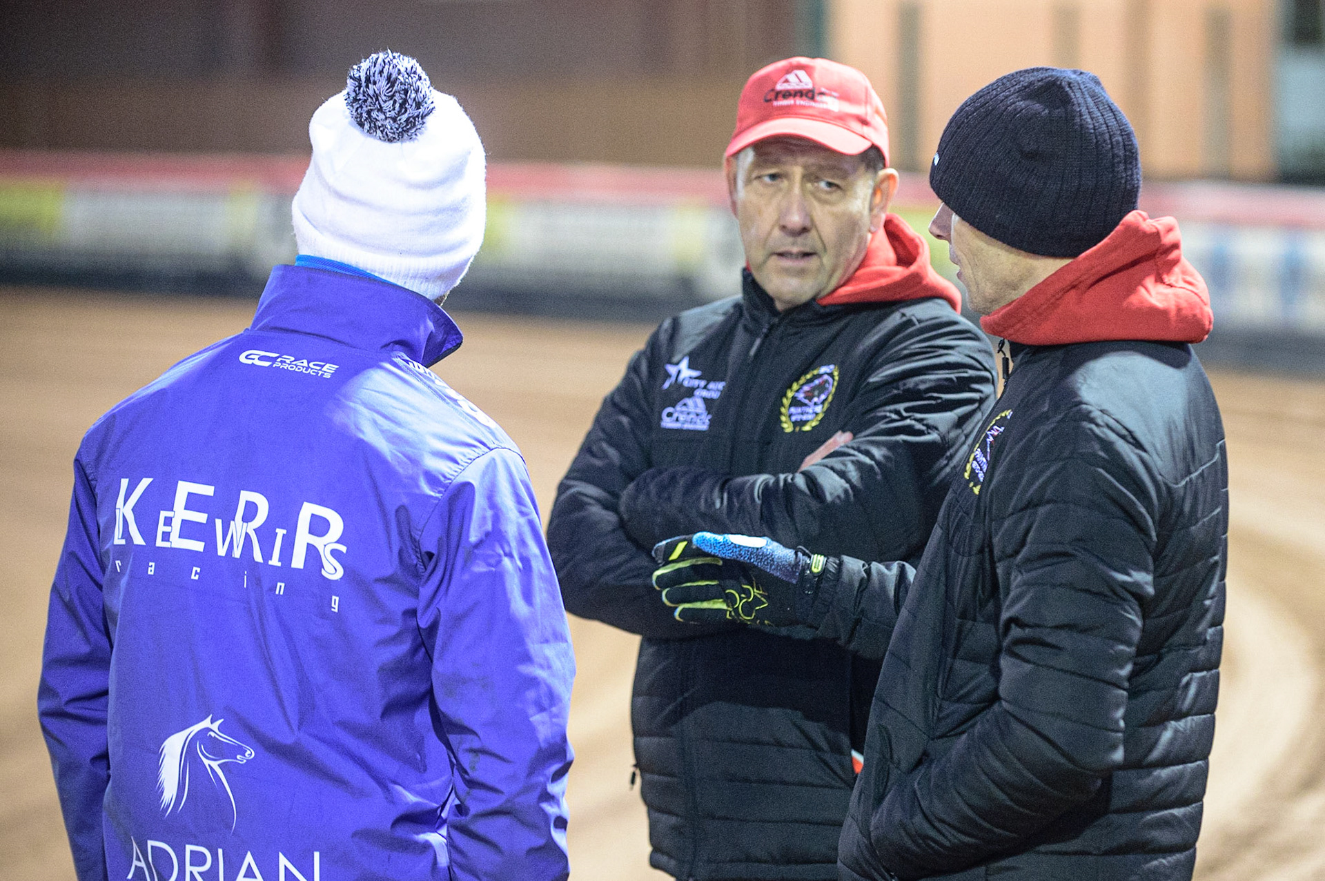 MANCHESTER, UK. OCT 11TH  Peterborough Crendon Panthers  manager Rob Lyon (centre) chats with Lewis Kerr (left) and Bjarne Pedersen  during the SGB Premiership Grand Final 1st Leg between Belle Vue Aces and Peterborough Panthers at the National Speedway Stadium, Manchester on Monday 11th October 2021. (Credit: Ian Charles | MI News)