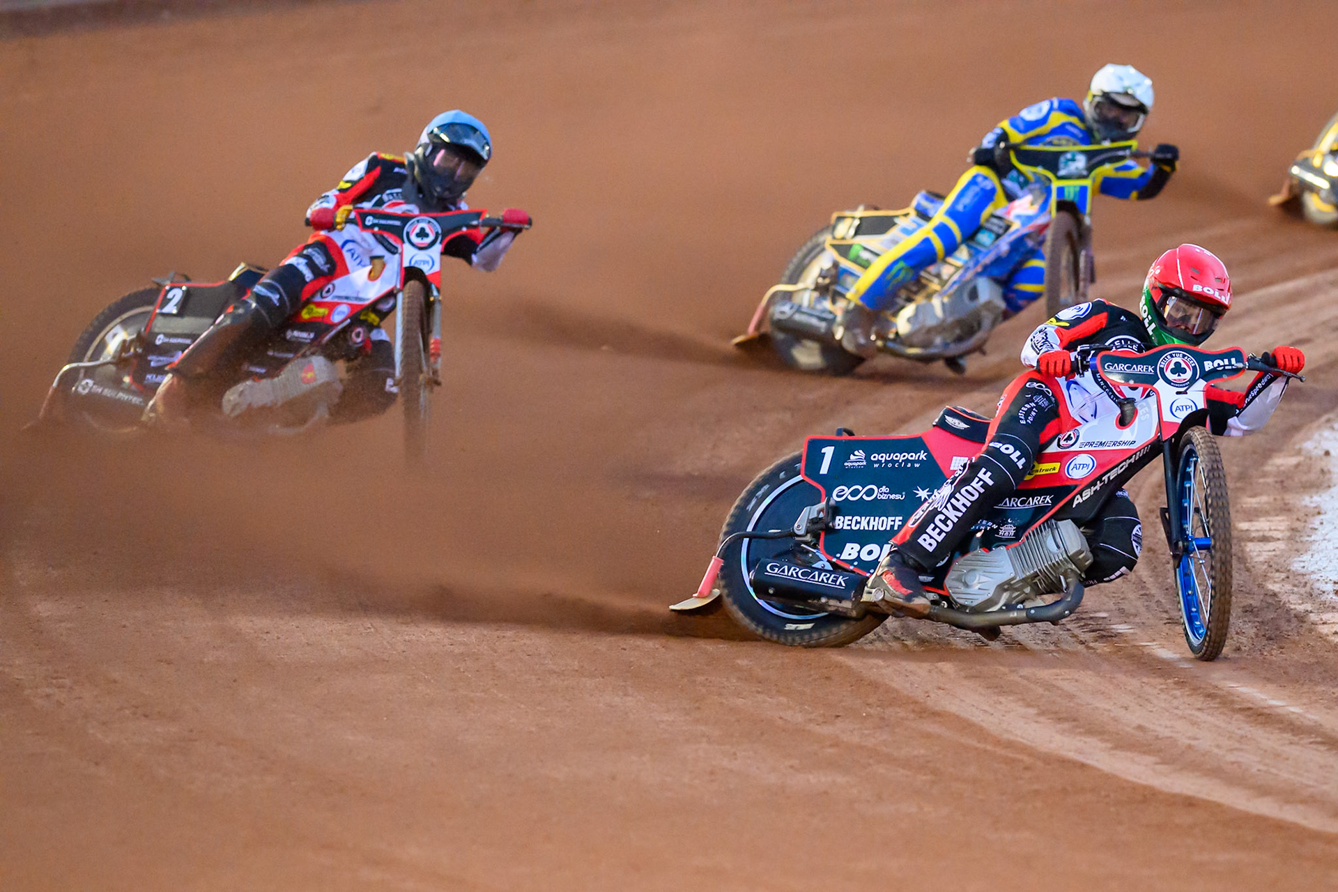 Brady Kurtz of Belle Vue Aces in Red leading Norick Blodorn of Belle Vue Aces  in Blue and Jack Holder of Sheffield Tigers   in White during the Knockout Cup, Northern Section match between Belle Vue Aces and Sheffield Tigers at the National Speedway Stadium, Manchester on Monday 30th March 2026. (Photo: Ian Charles | MI News)