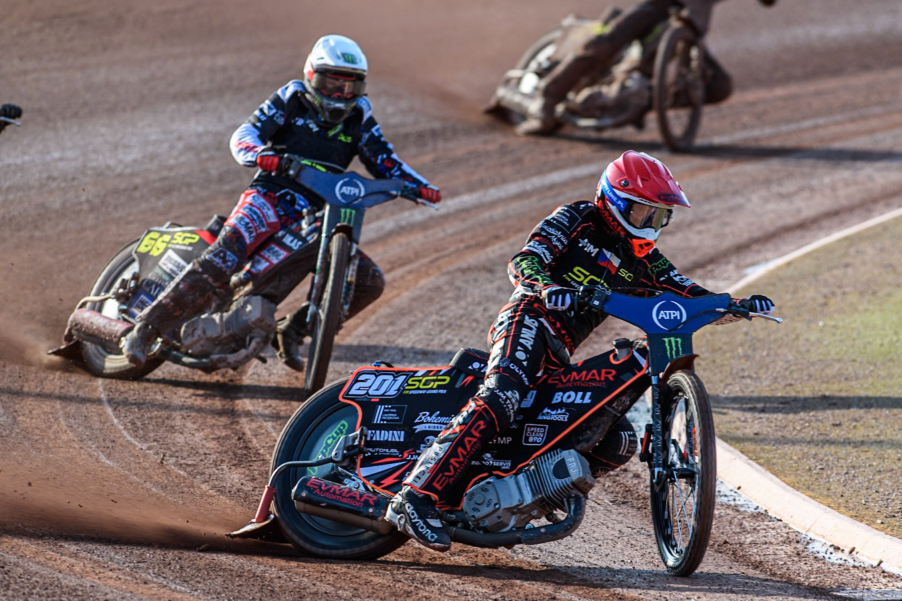 January Kvech (201) of Czech Republic in Red leading Fredrik Lindgren (66) of Sweden in White during the ATPI FIM Speedway Grand Prix Round 5 at the National Speedway Stadium, Manchester, on Saturday 14th June 2025. (Photo: Ian Charles | MI News)