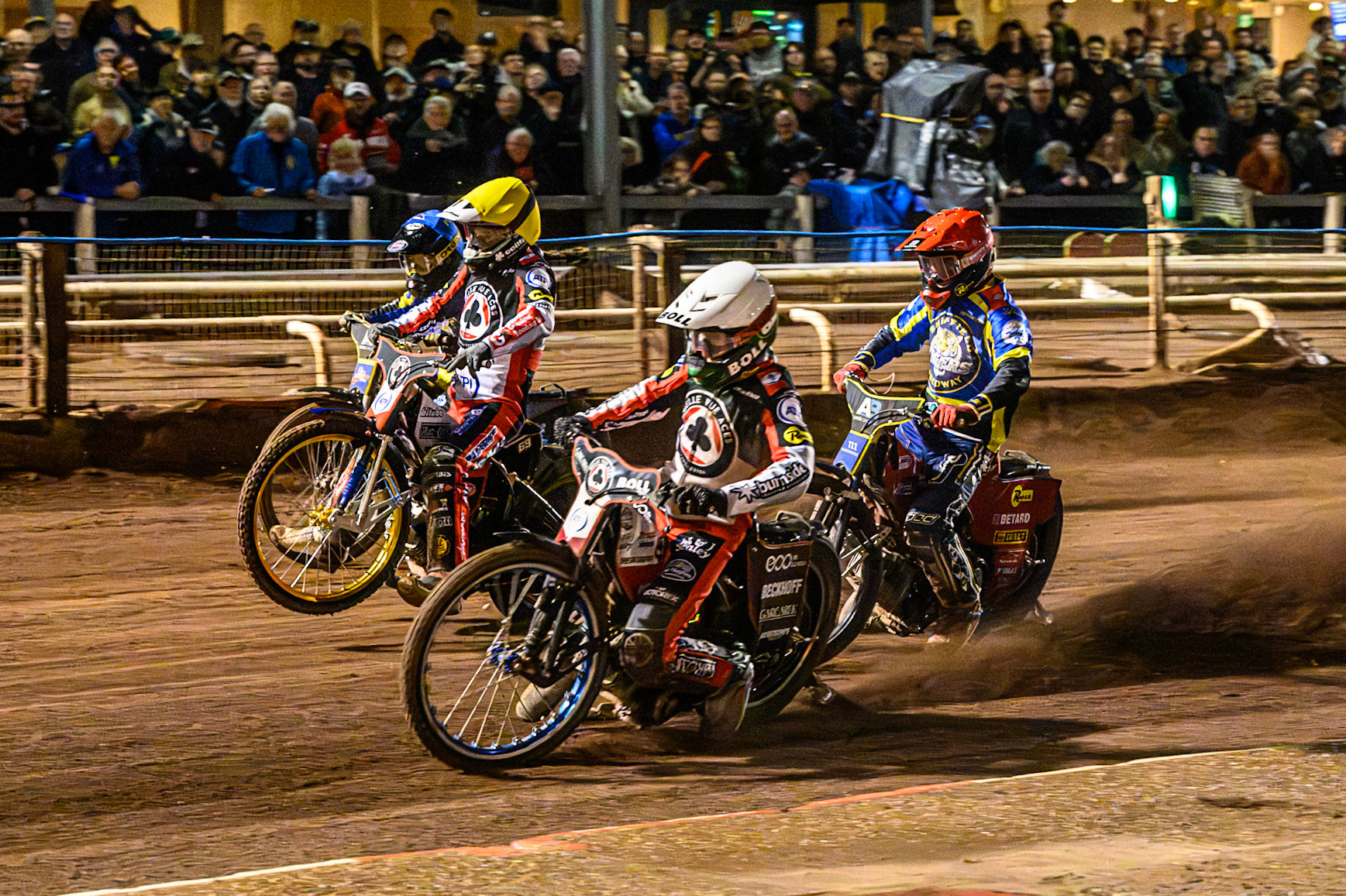 Brady Kurtz of Belle Vue Aces in White rides inside Jason Doyle of Belle Vue Aces in Yellow , Max Fricke, Guest Rider for Sheffield Tigers in Red  and Josh Pickering of Sheffield Tigers in Blue during the Rowe Motor Oil Premiership Grand Final 1st Leg match between Sheffield Tigers and Belle Vue Aces at Owlerton Stadium, Sheffield on Monday 12th October 2026. (Photo: Ian Charles | MI News)