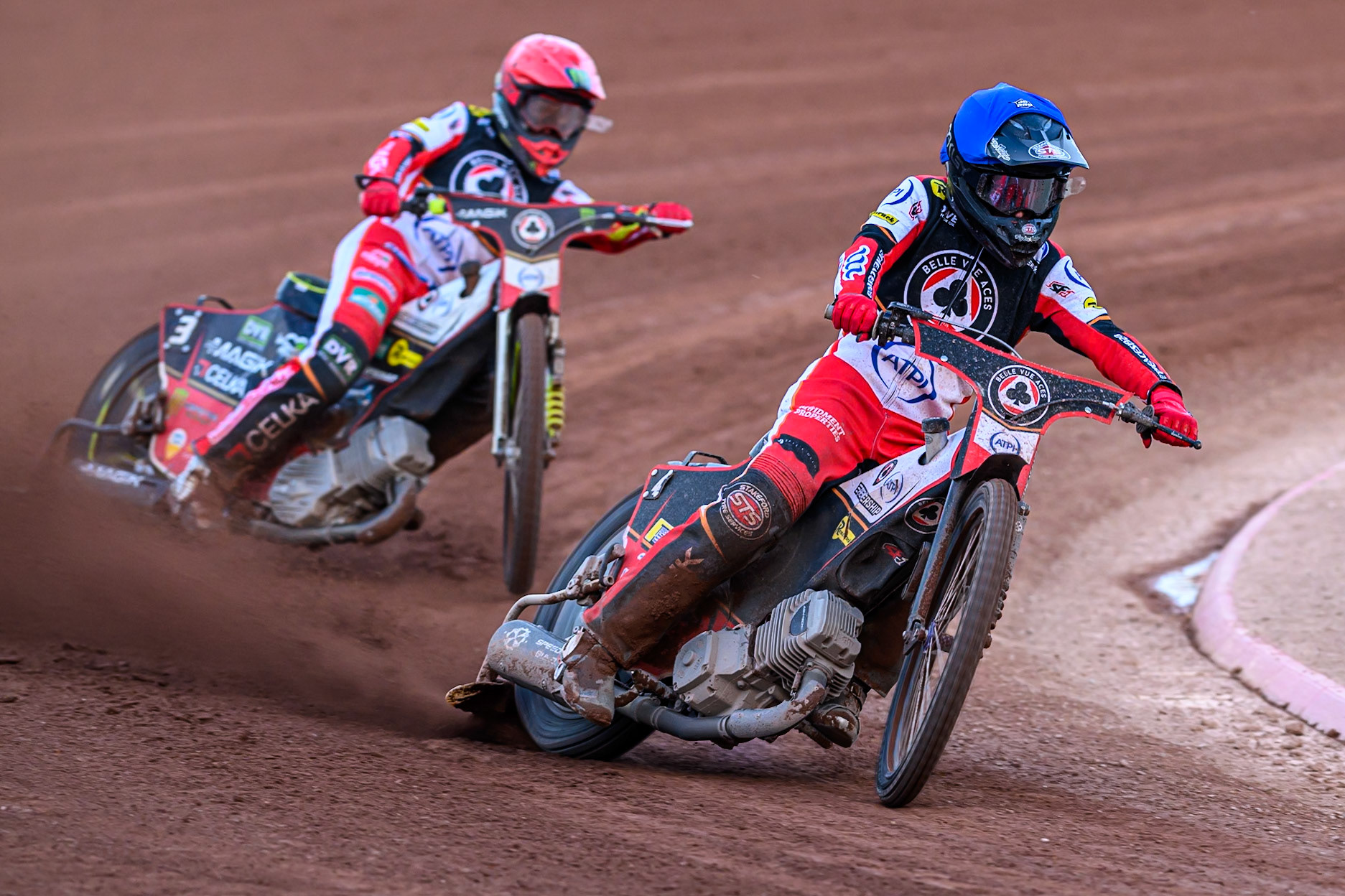 Belle Vue Aces' Zach Cook in Blue leading Belle Vue Aces' Jaimon Lidsey  in Red during the Rowe Motor Oil Premiership match between Belle Vue Aces and Ipswich Witches at the National Speedway Stadium, Manchester on Monday 30th June 2025. (Photo: Ian Charles | MI News)