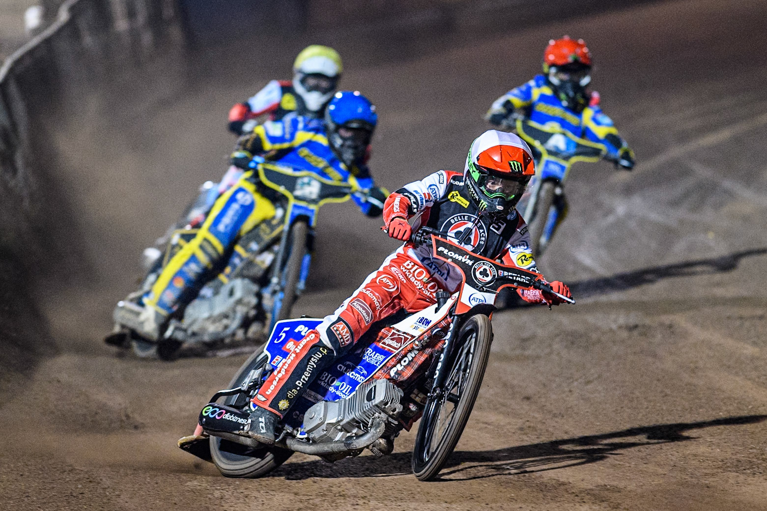 Belle Vue Aces' Dan Bewley  in White leading Sheffield Tigers' Kyle Howarth  in Blue Belle Vue Aces' Antti Vuolas in White and Sheffield Tigers' Jack Holder  in Red during the Rowe Motor Oil Premiership Play Off Semi Final 2nd leg between Sheffield Tigers and Belle Vue Aces at Owlerton Stadium, Sheffield on Thursday 19th September 2024. (Photo: Ian Charles | MI News)