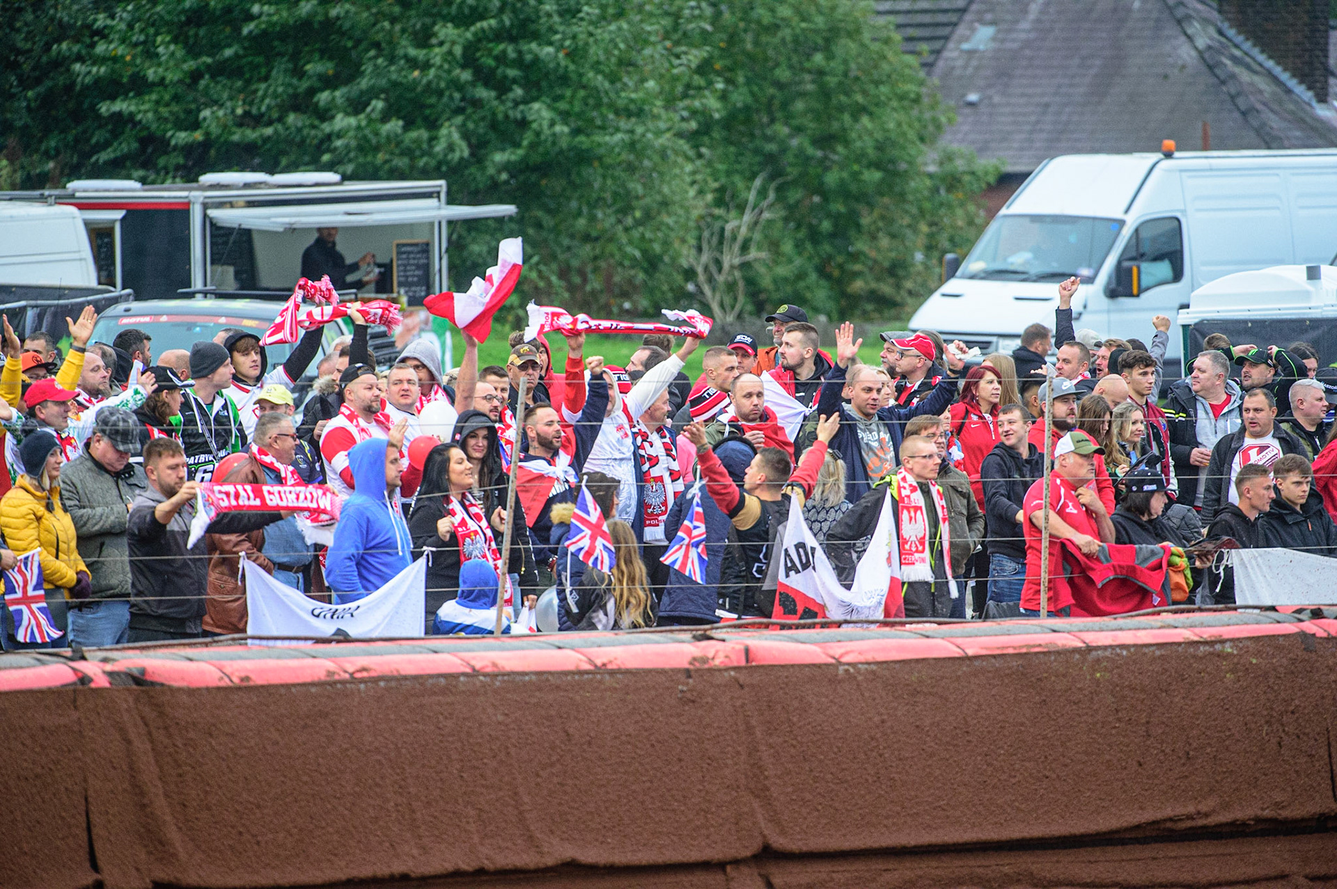 MANCHESTER, UK. OCT 17TH Polish fans celebrate their heat win during the Monster Energy FIM Speedway of Nations at the National Speedway Stadium, Manchester on Sunday  17th October 2021. (Credit: Ian Charles | MI News)