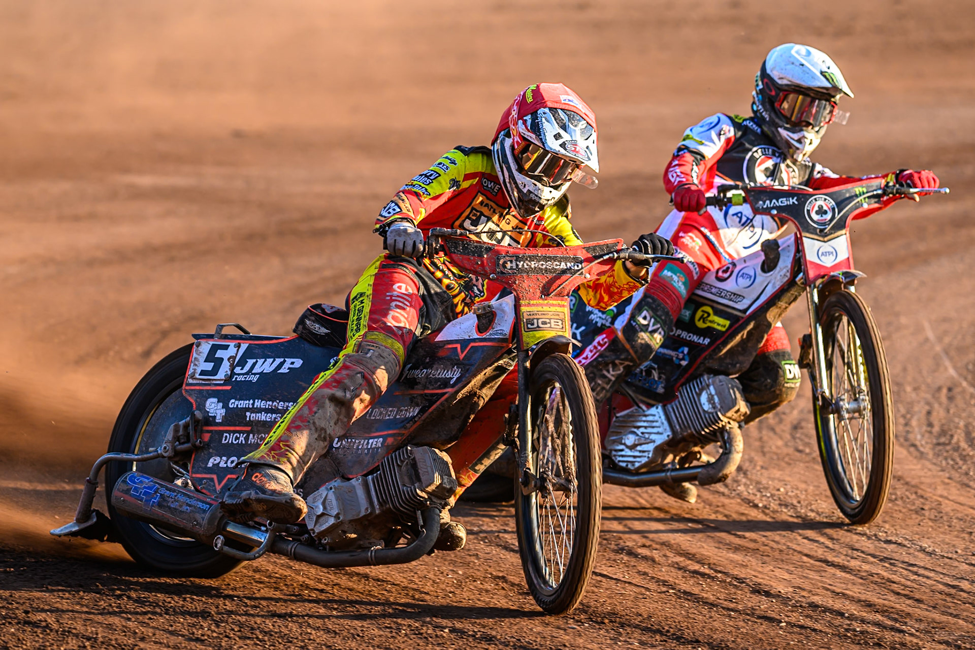 Leicester Lions' Sam Masters in Red leading Belle Vue Aces' Jaimon Lidsey in White during the Rowe Motor Oil Premiership match between Leicester Lions and Belle Vue Aces at the Hydroscand Arena, Leicester on Thursday 19th June 2025. (Photo: Ian Charles | MI News)