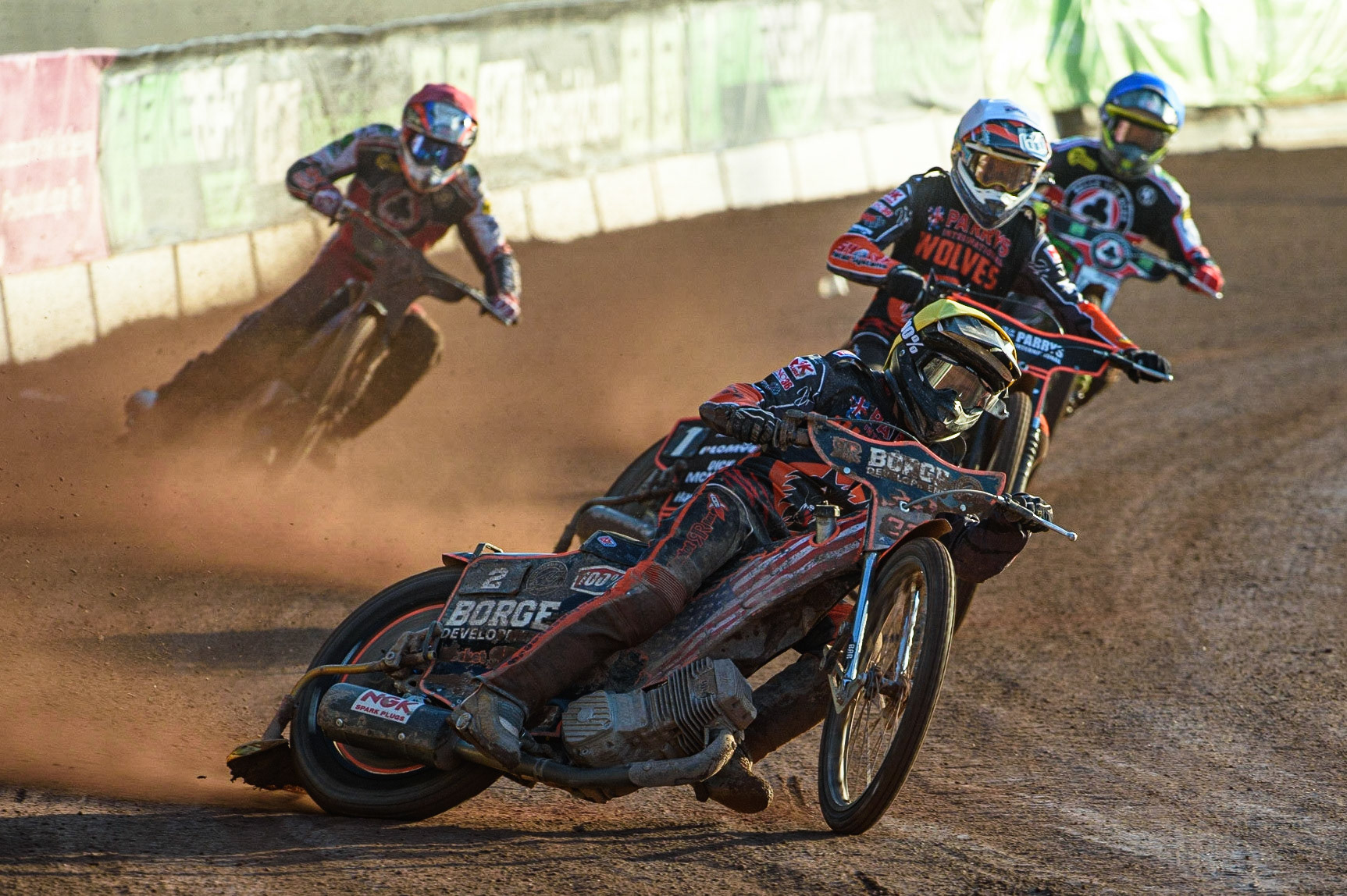 MANCHESTER, UK. JULY 15TH   Luke Becker  (Yellow) leads Sam Masters  (White) Steve Worrall  (Red) and Charles Wright  (Blue) during the SGB Premiership match between Belle Vue Aces and Wolverhampton Wolves at the National Speedway Stadium, Manchester on Thursday 15th July 2021. (Credit: Ian Charles | MI News)