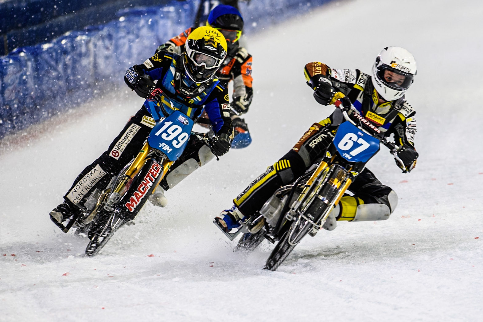 Heikki Huusko (67) of Finland in White rides inside Martin Haarahiltunen (199) of Sweden in Yellow with Lukas Hutla (212) of the Czech Republic in Blue behind during the FIM Ice Speedway Gladiators World Championship, Final 4 at the Ice Stadium, Thialf, Heerenveen on Sunday 6th April 2025. (Photo: Ian Charles | MI News)
