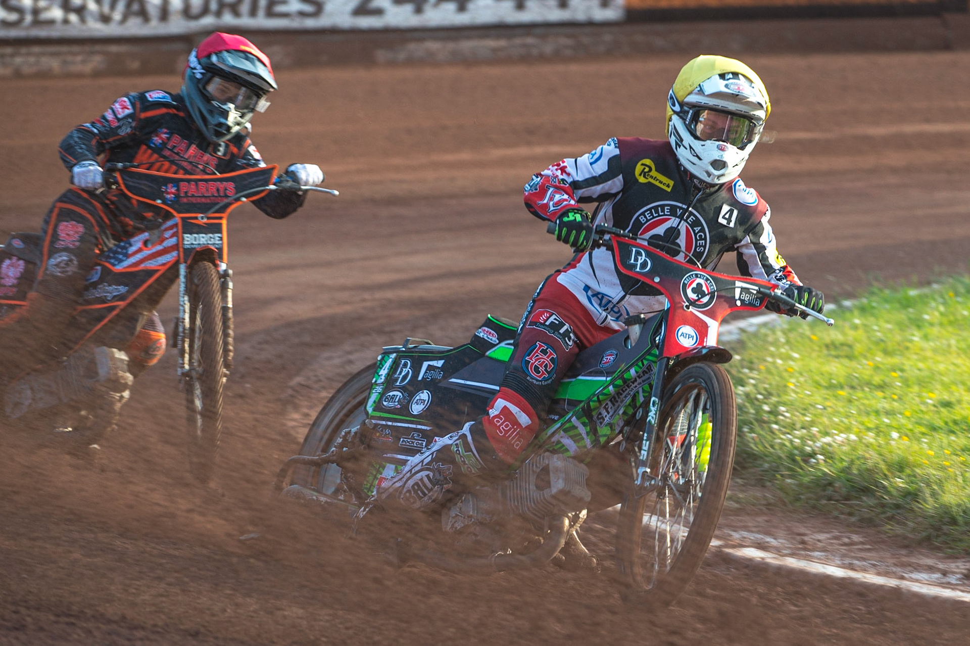 WOLVERHAMPTON, UK. JUN 20TH Charles Wright  (Yellow) leads Luke Bekker  (Red) during the SGB Premiership match between Wolverhampton Wolves and Belle Vue Aces at Monmore Green Stadium, Wolverhampton on Monday 20th June 2022. (Credit: Ian Charles | MI News)