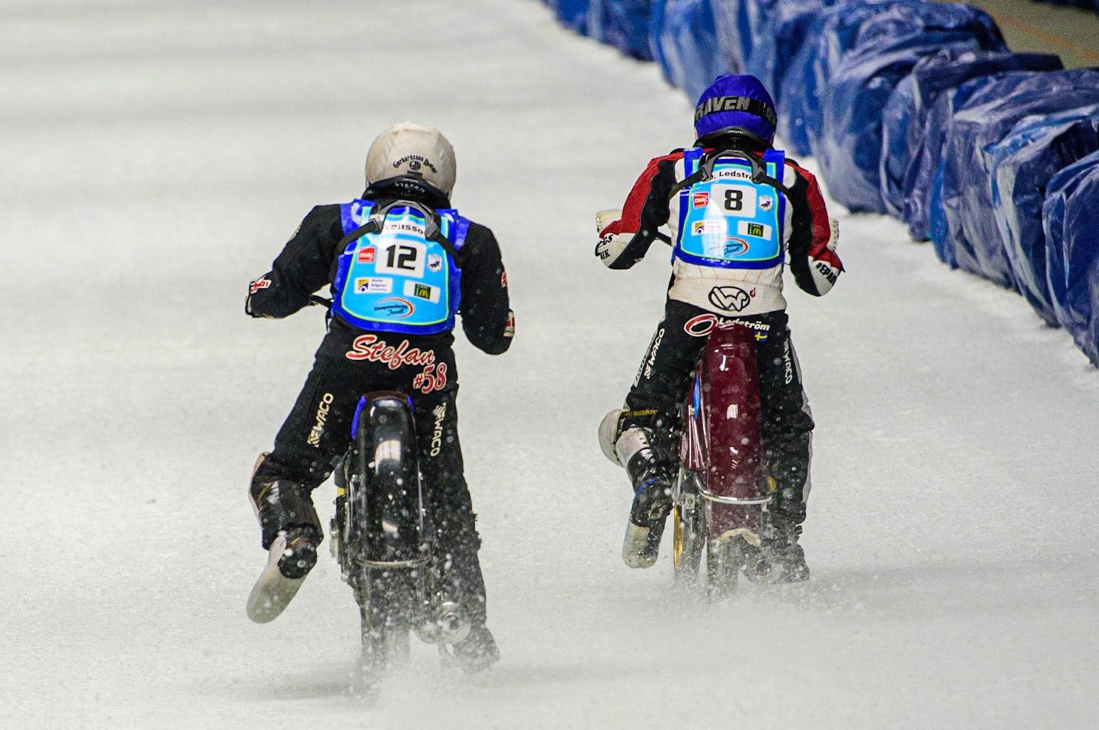 Stefan Svensson (White) chases Ove Ledström (Blue) during the Race of Legends at the Max-Aicher-Arena, Inzell on Friday 17th March 2023. (Photo: Ian Charles | MI News)
