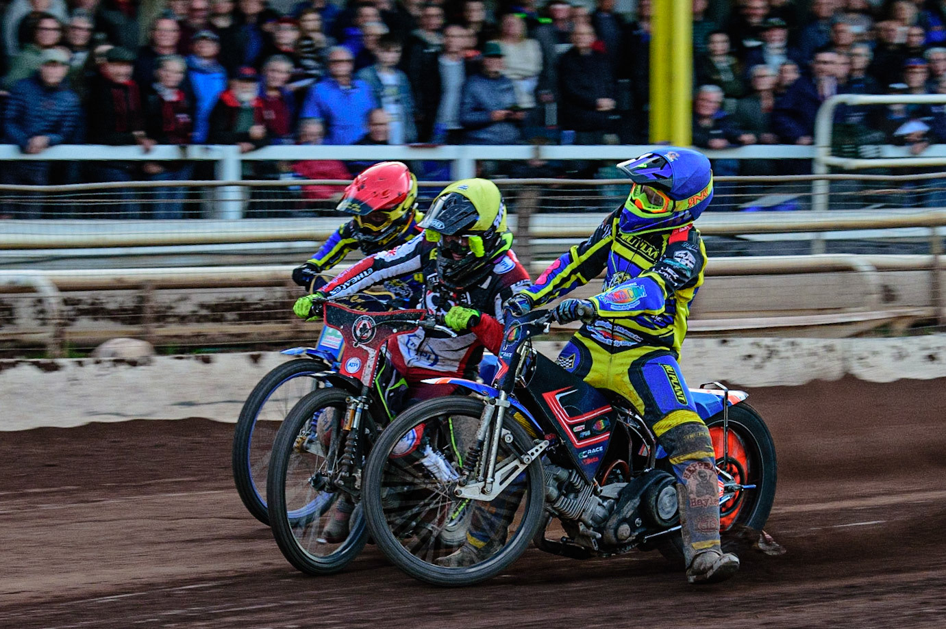 SHEFFIELD, UK. MAY 26TH  Stefan Nielsen  loses control and collides with Tom Brennan  (Yellow) with Kyle Howarth  (Red) on the outside during the SGB Premiership match between Sheffield Tigers and Belle Vue Aces at Owlerton Stadium, Sheffield on Thursday 26th May 2022. (Credit: Ian Charles | MI News)