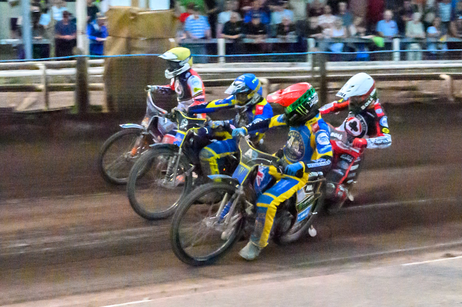 Jack Holder of Sheffield Tigers in Red rides inside Brady Kurtz of Belle Vue Aces in White Josh Pickering of Sheffield Tigers in Blue and Niels-Kristian Iversen, Guest Rider for Belle Vue Aces in Yellow during the Rowe Motor Oil Premiership match between Sheffield Tigers and Belle Vue Aces at Owlerton Stadium, Sheffield on Monday 25th May 2026. (Photo: Ian Charles | MI News)