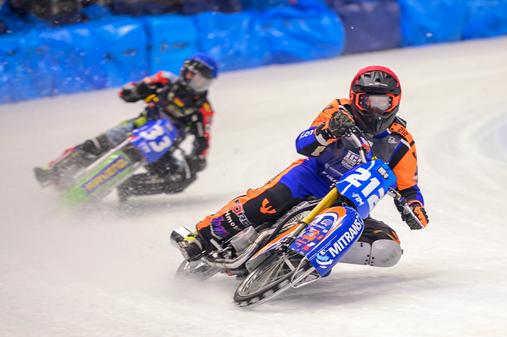 Lukas Hutla (212) of Czechia  in Red leading Johann Weber (33) of Germany  in Blue during the Ice Speedway Gladiators World Championship Final 1 at Max-Aicher-Arena, Inzell on Saturday 14th March 2026. (Photo: Ian Charles | MI News)