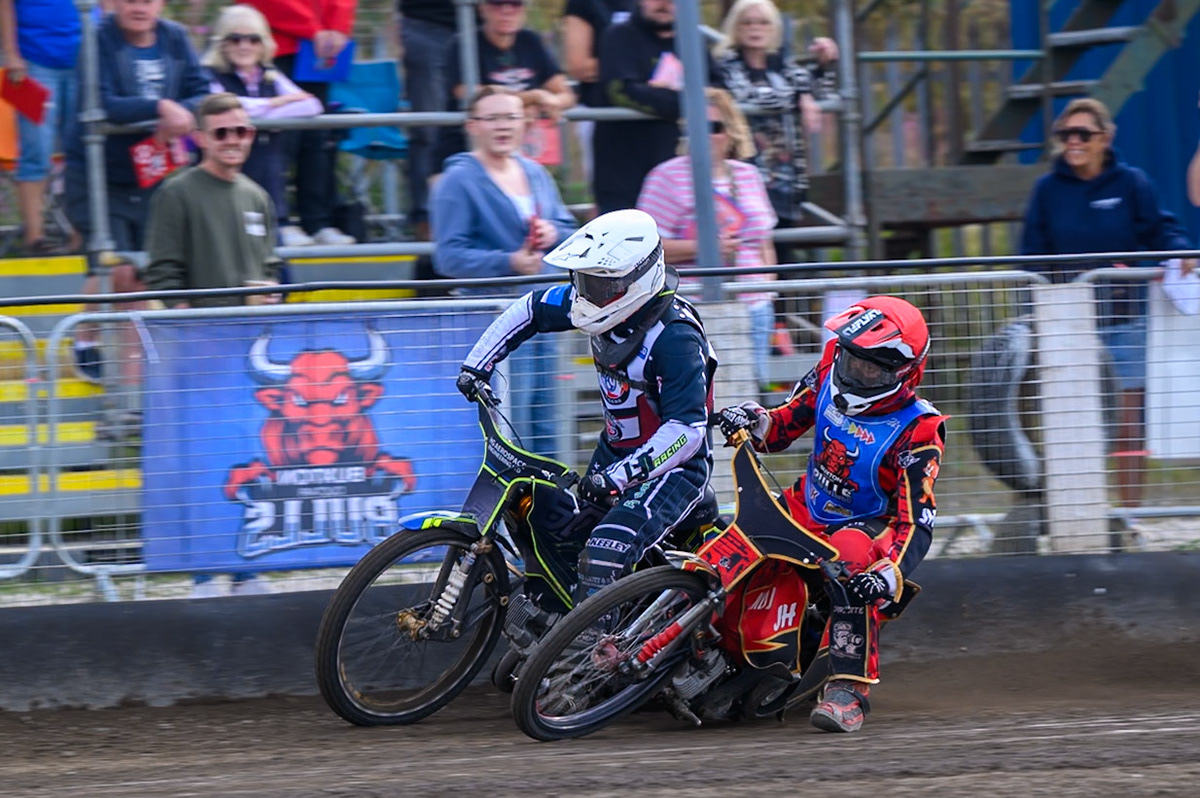 Nathan Ablitt of Middlesborough Tigers in White forces his way past Luke Harris of Buxton Bulls in Red during the WSRA National Development League match  between Buxton Bulls and Middlesborough Tigers at Hi-Edge Speedway, Buxton on Sunday 16th August 2026. (Photo: Ian Charles | MI News)