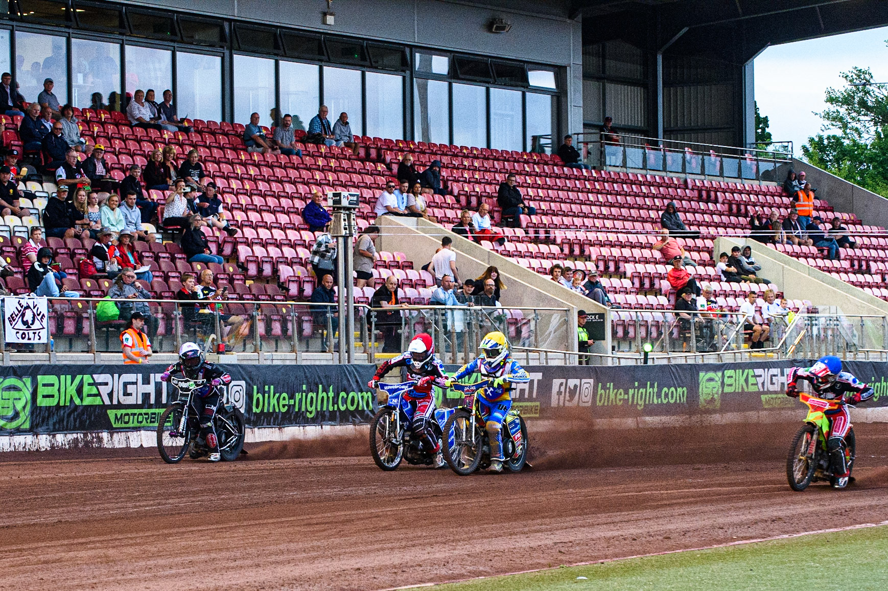 MANCHESTER, UK. JULY 23RD Start of Heat 8 with (l-r) Connor King  (White), Harry McGurk  (Red), Nathan Ablitt  (Yellow) and Ben Woodhull  (Blue) during the National Development League match between Belle Vue Colts and Eastbourne Seagulls at the National Speedway Stadium, Manchester on Friday 23rd July 2021. (Credit: Ian Charles | MI News)