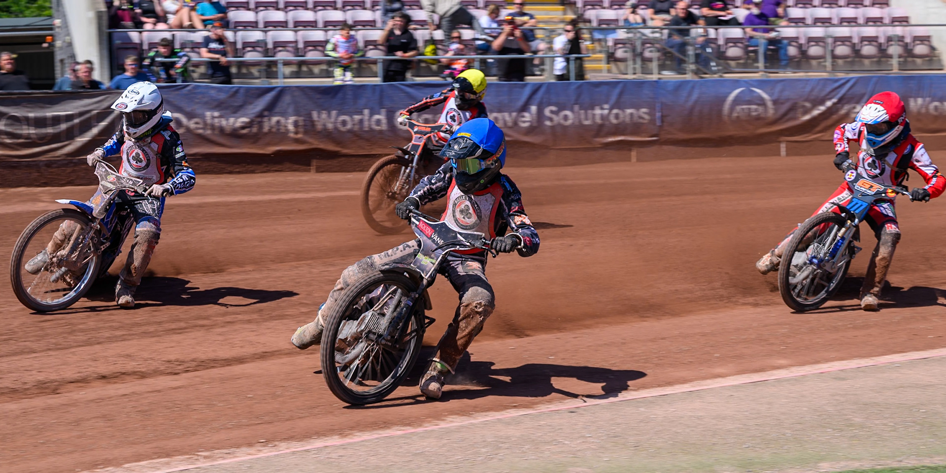 COLTS ACADEMY INDIVIDUAL EVENT Seth Norman in Blue rides inside Lee Harrison in White with Billy Budd in Red and Harry Sadler  in Yellow behind during the JR Ashworth &amp; Sons Colts Academy Event at the National Speedway Stadium, Manchester on Sunday 19th July 2026. (Photo: Ian Charles | MI News)