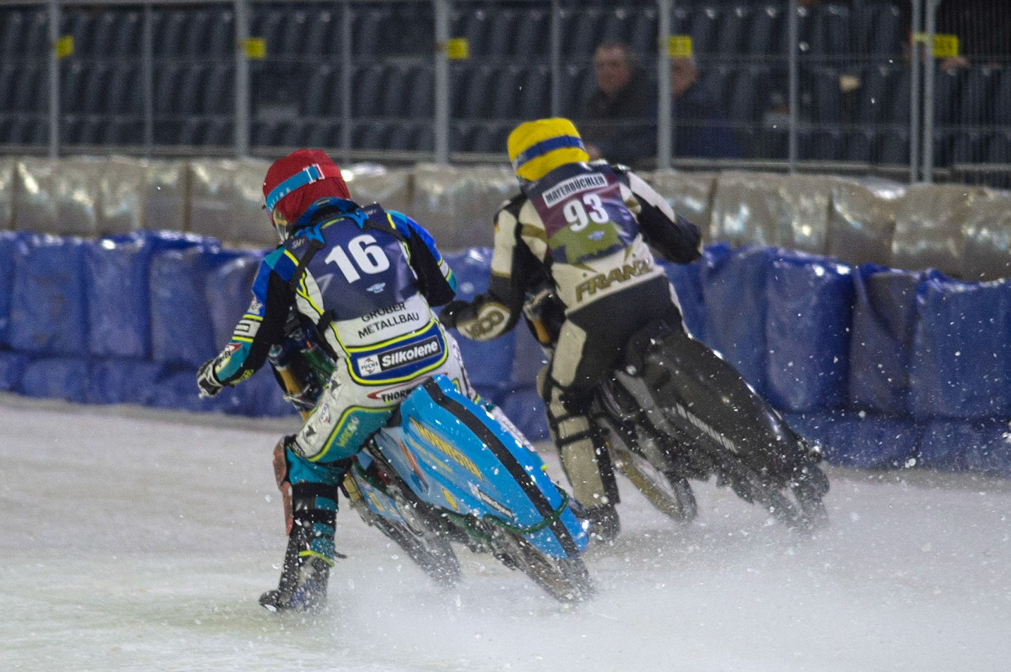 HEERENVEEN, NL. Luca Bauer (16) (Red) inside Franz Mayerbüchler (93) (Yellow) during the FIM Ice Speedway Gladiators World Championship Final 3 at Ice Rink Thialf, Heerenveen on Saturday  2 April 2022. (Credit: Ian Charles | MI News)