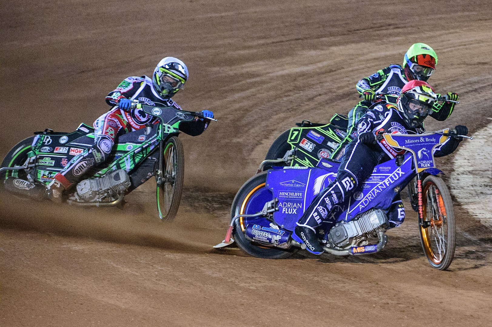 MANCHESTER, UK. OCT 23RD  Erik Riss  (Red) leads Jye Etheridge  (Yellow) and Charles Wright  (White) during the Peter Craven Memorial Trophy event at the National Speedway Stadium, Manchester on Saturday 23rd October 2021. (Credit: Ian Charles | MI News)
