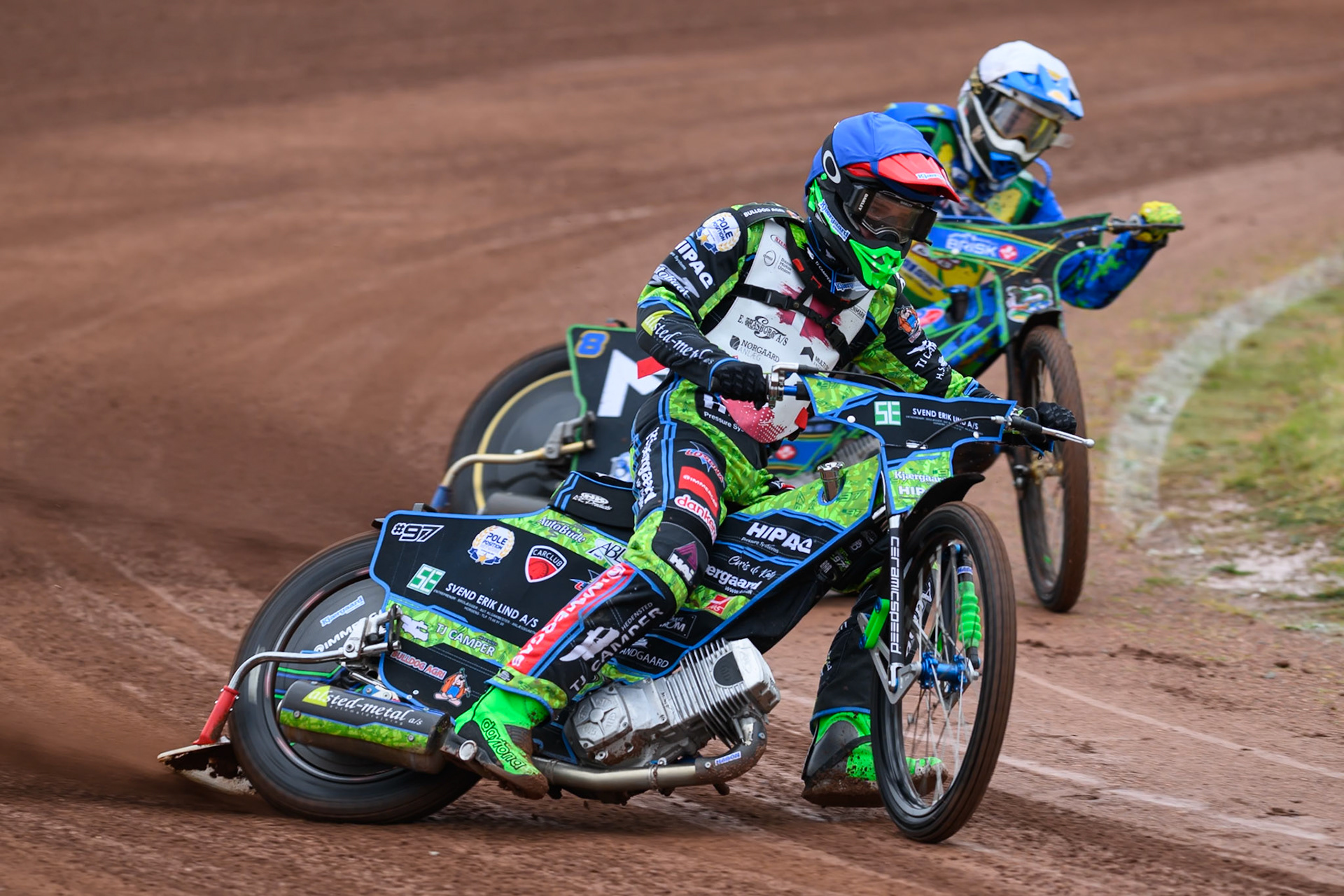 Mikkel Andersen of Denmark in Blue leading Michael West of Australia in White during the FIM SGP2 Qualifying Round at the Peugeot Ashfield Stadium in Glasgow on Saturday 24th May 2025. (Photo: Ian Charles | MI News)