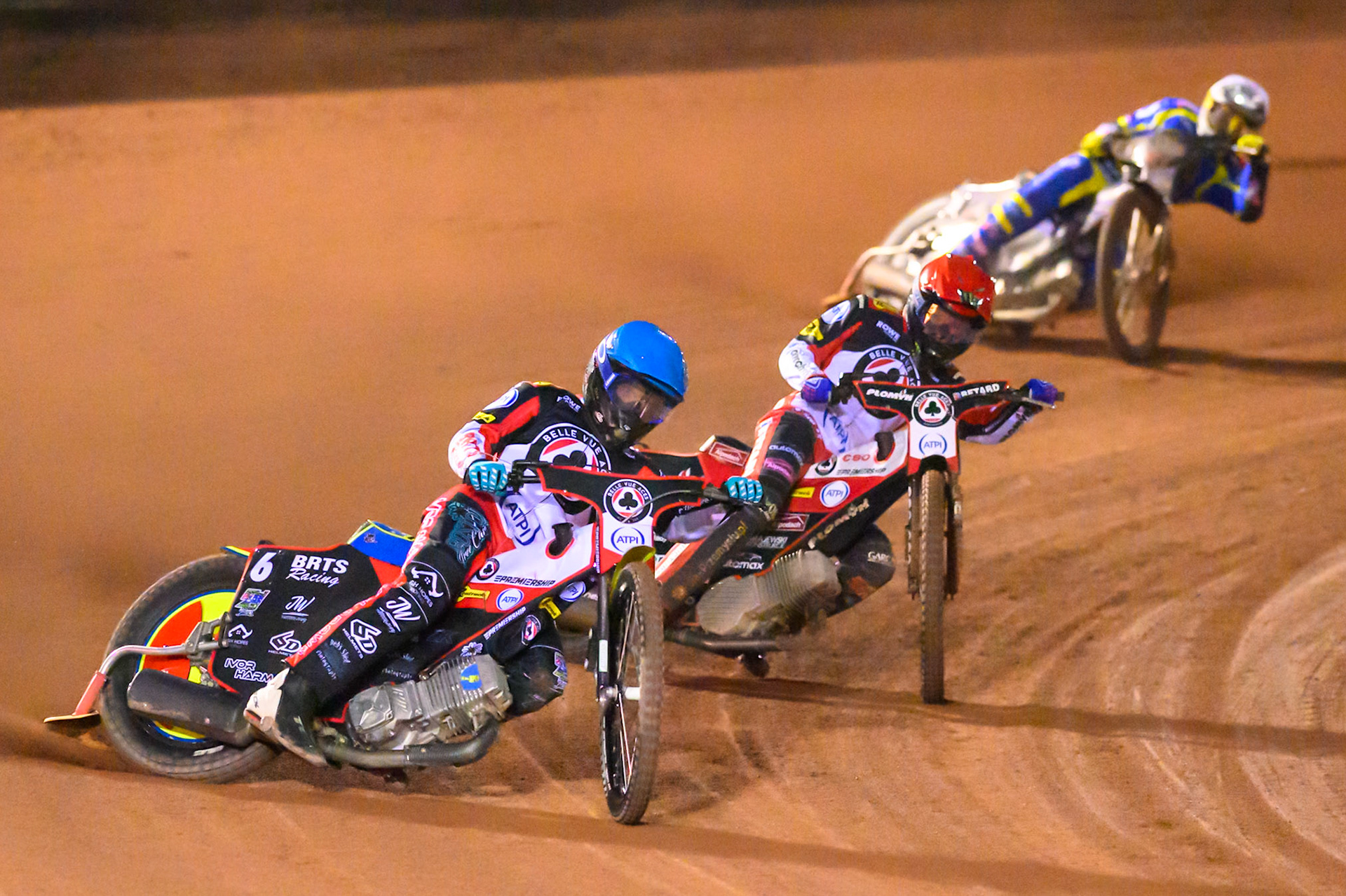 Tate Zischke of Belle Vue Aces  in Blue leading Dan Bewley of Belle Vue Aces   in Red and Josh Pickering of Sheffield Tigers in White during the Knockout Cup, Northern Section match between Belle Vue Aces and Sheffield Tigers at the National Speedway Stadium, Manchester on Monday 30th March 2026. (Photo: Ian Charles | MI News)