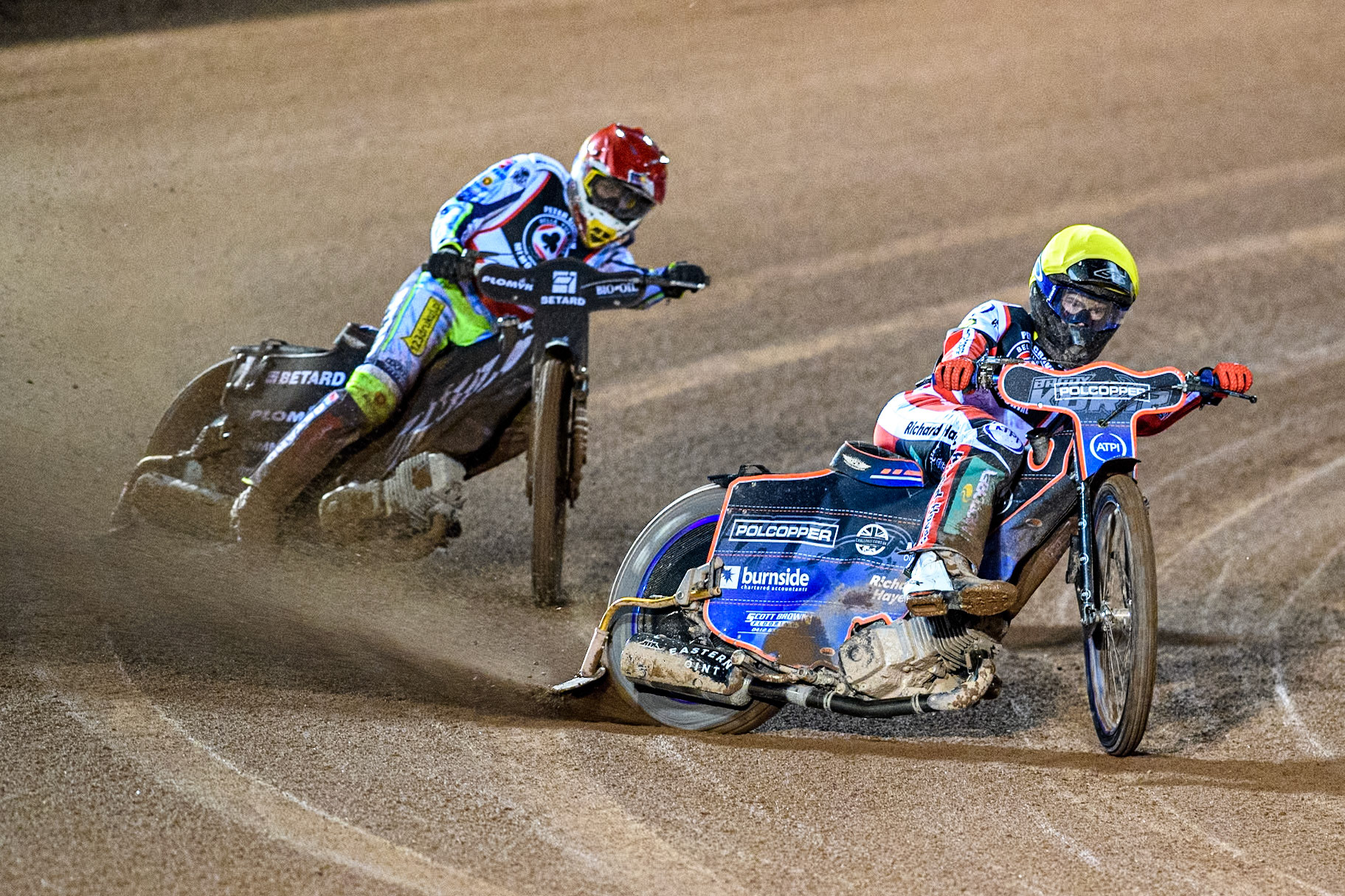 Australia's Brady Kurtz (Yellow) leads  Poland’s Maceij Janowski (Red) during the Peter Craven Memorial Trophy meeting at the National Speedway Stadium, Manchester on Monday 18th March 2024. (Photo: Ian Charles | MI News)