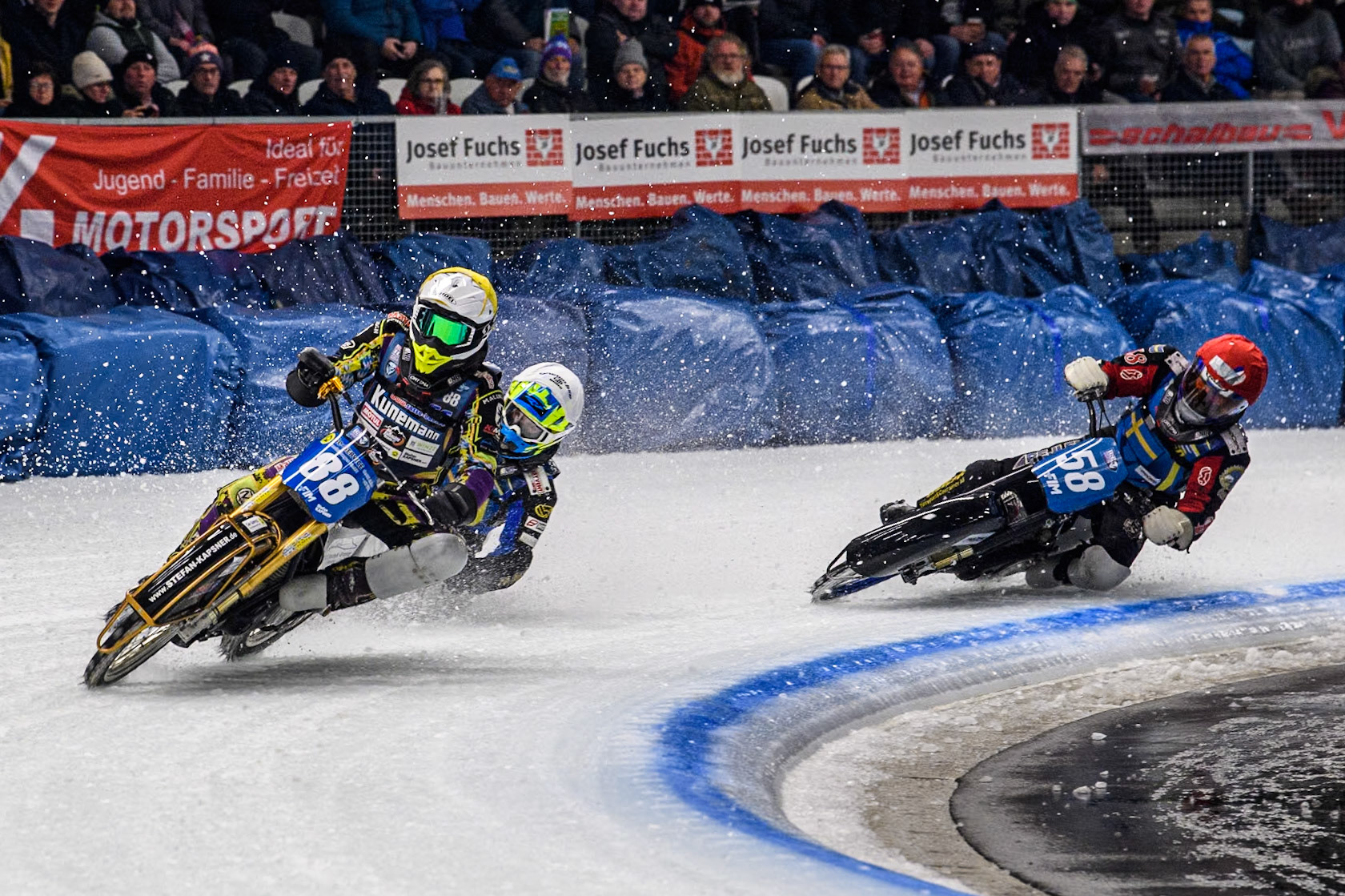 Germany's Max Niedermaier (88) (Yellow) hits a rut as he leads Sweden's Martin Haarahiltunen (199)  (White) and Sweden's Stefan Svensson (58) (Red) during the FIM Ice Speedway Gladiators World Championship Final 1 at the Max-Aicher-Arena, Inzell on Saturday 23 March 2024. (Photo: Ian Charles | MI News)