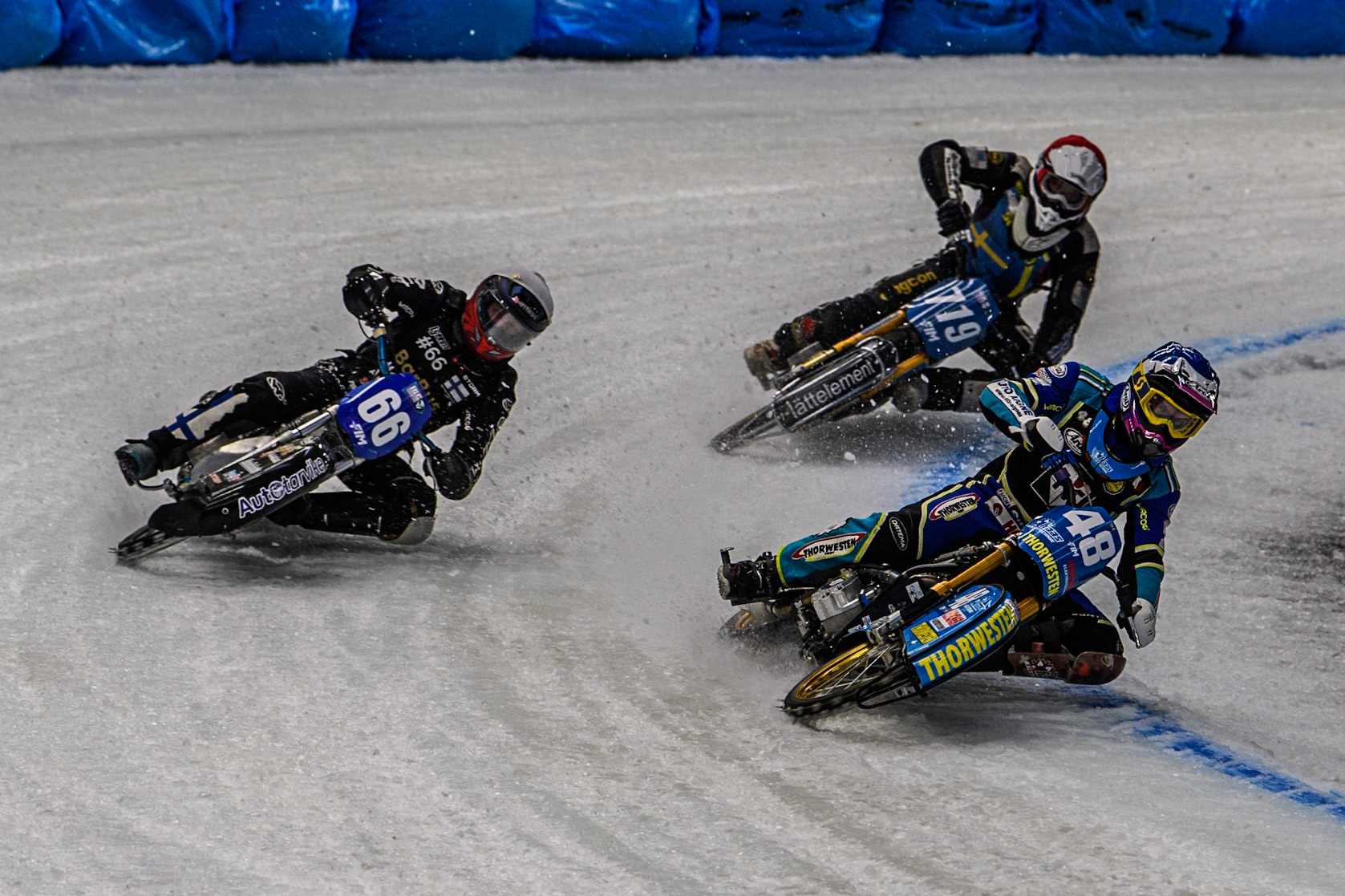 Luca Bauer (48) of Germany in Blue rides inside Aki Ala-Riihimäki (66) of Finland in White with Jimmy Olsén (81) of Sweden (riding the bike 719) during the Ice Speedway Gladiators World Championship Final 2 at Max-Aicher-Arena, Inzell on Sunday 16th March 2025. (Photo: Ian Charles | MI News)