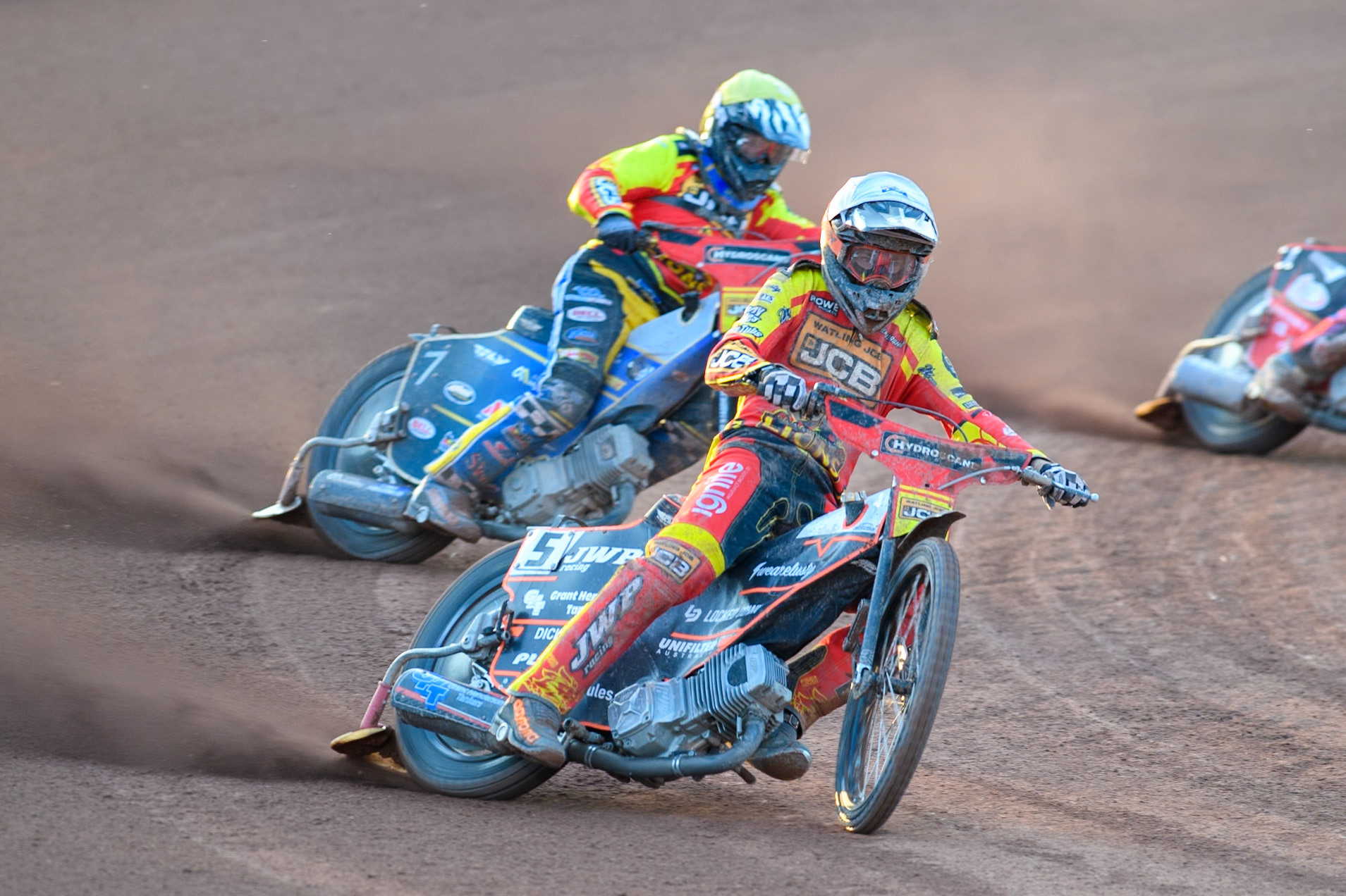 Leicester Lions' Sam Masters in White leading team mate Joe Thompson in Yellow during the Rowe Motor Oil Premiership match between Belle Vue Aces and Leicester Lions at the National Speedway Stadium, Manchester on Monday 19th May 2025. (Photo: Ian Charles | MI News)